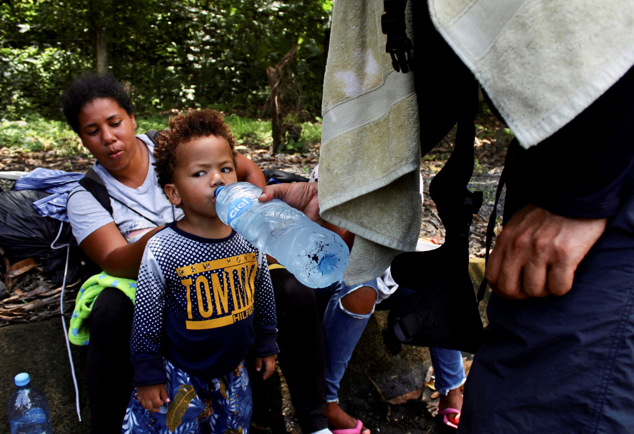 Migrants take part in a new U.S.-bound caravan in southern Mexico