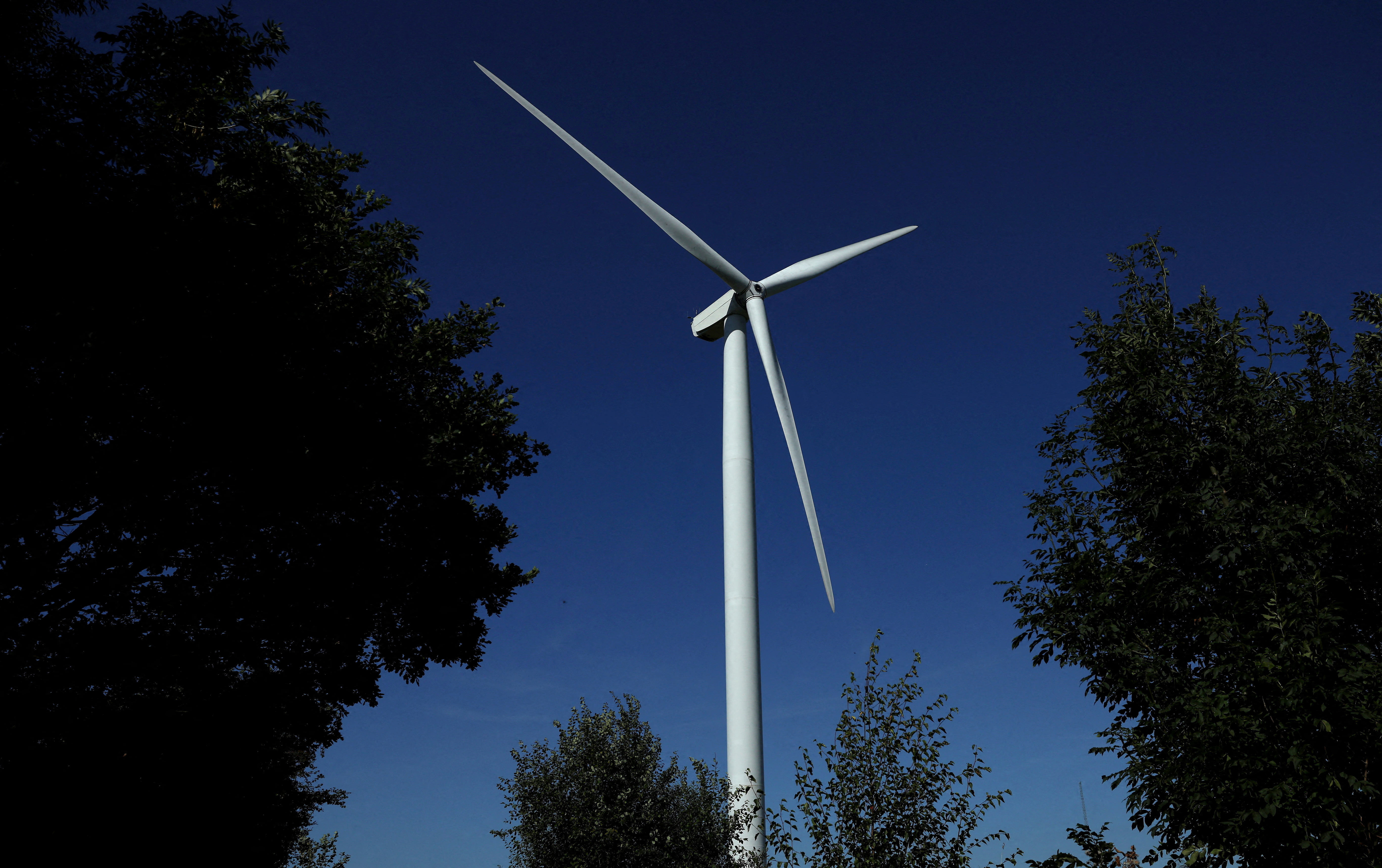 A wind turbine is seen on the Frodsham on shore wind farm in Frodsham, Britain