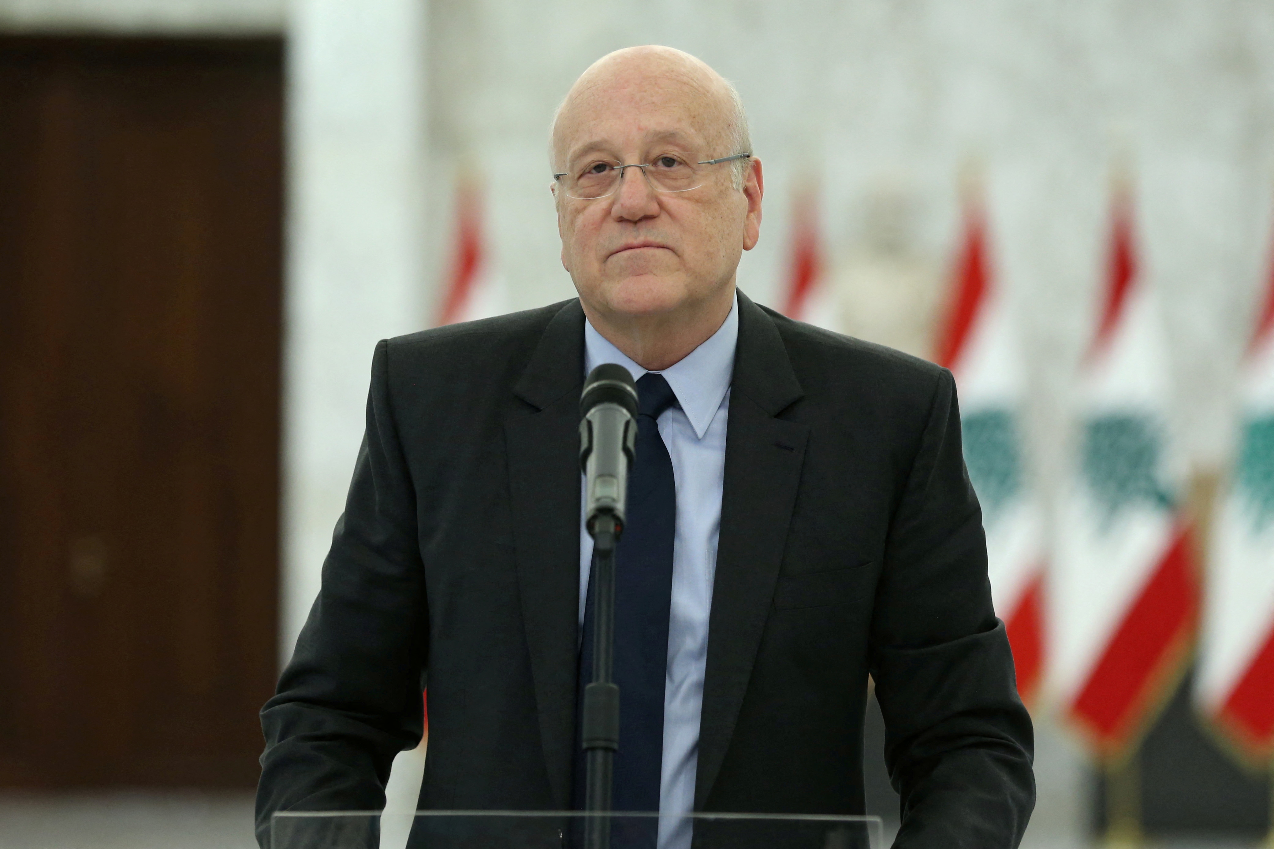 Lebanon's Prime Minister-Designate Najib Mikati speaks after meeting with Lebanon's President Michel Aoun, at the presidential palace in Baabda