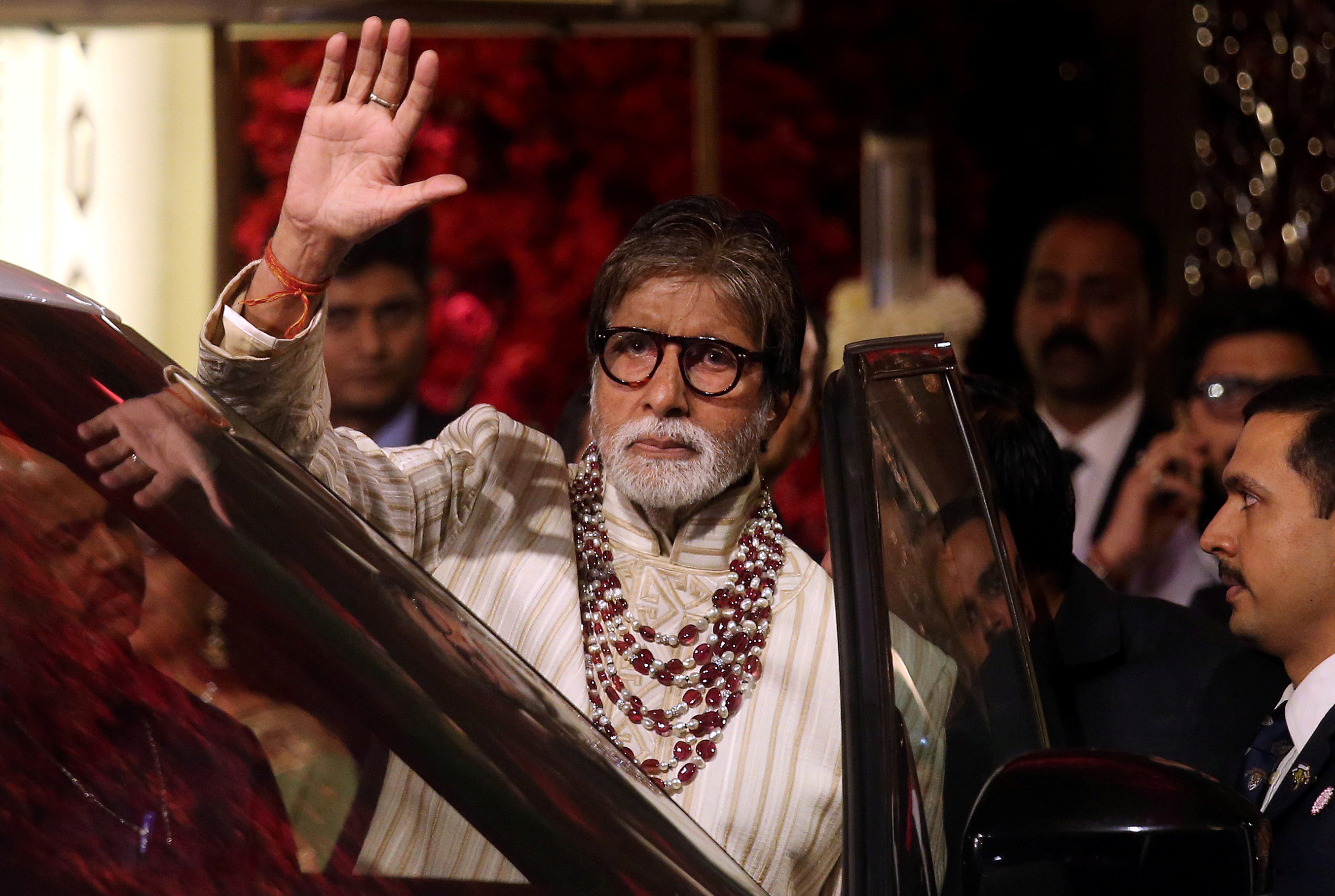 Bollywood actor Amitabh Bachchan leaves after attending the wedding ceremony of Isha Ambani, the daughter of the Chairman of Reliance Industries Mukesh Ambani, in Mumbai, India, December 13, 2018. REUTERS/Francis Mascarenhas/File Photo