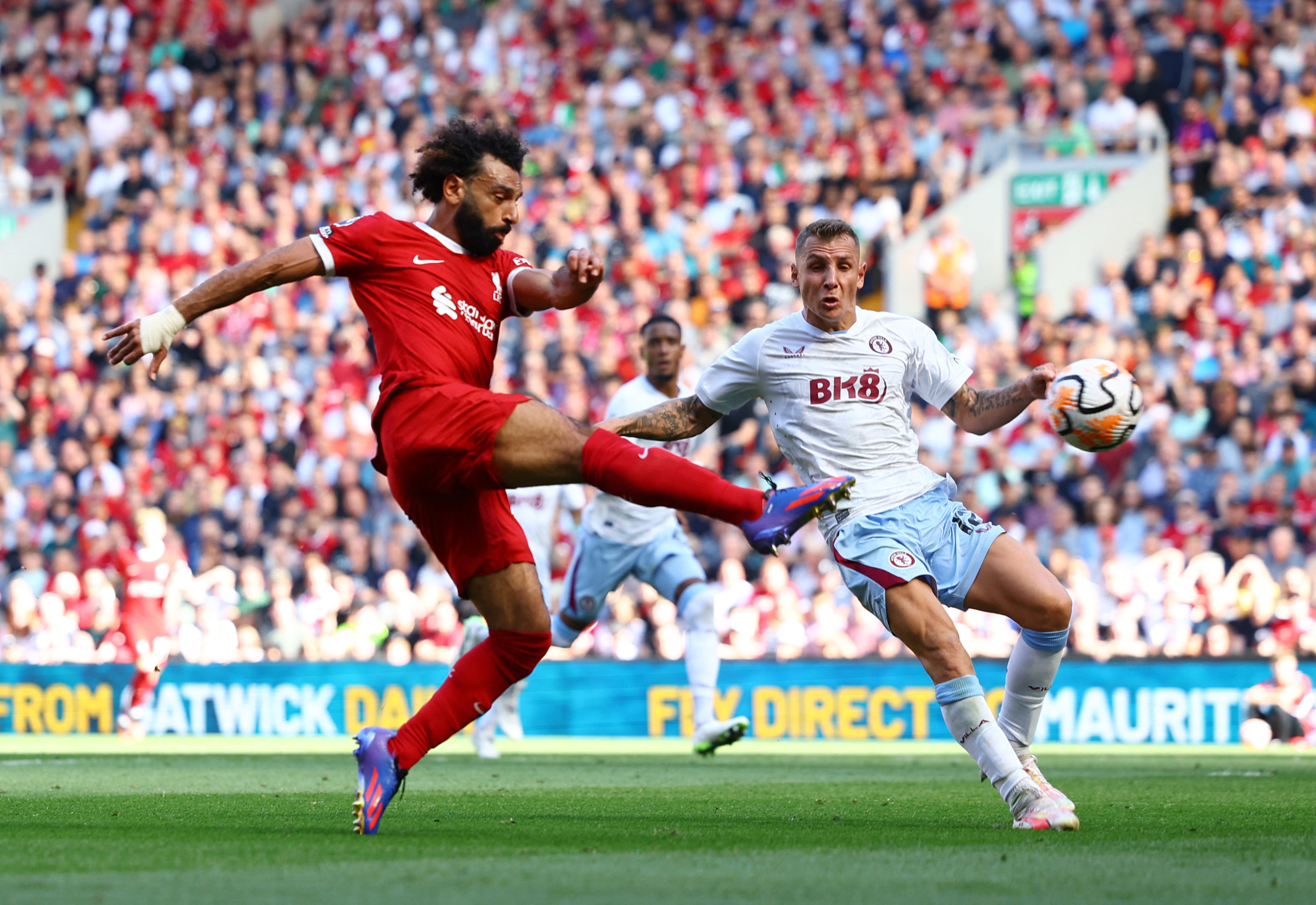 Szoboszlai, Salah score as Liverpool ease past Villa Reuters