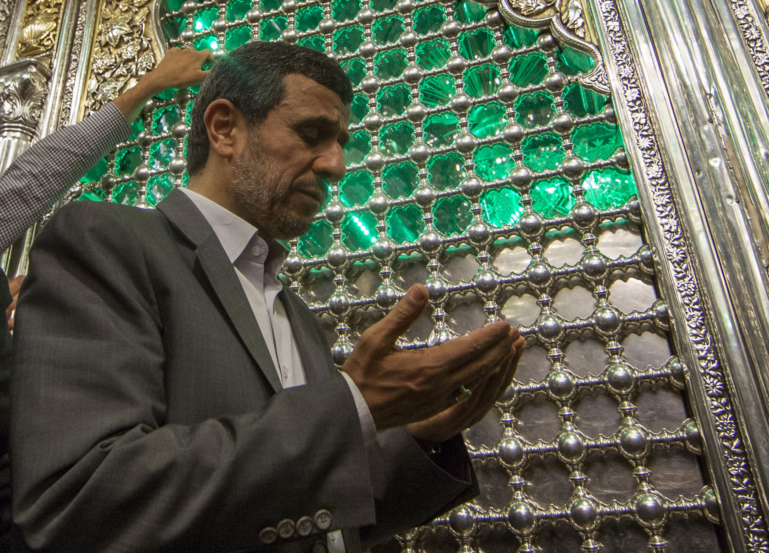 Iranian President Ahmadinejad visits the holy shrine of Imam Abbas in Kerbala