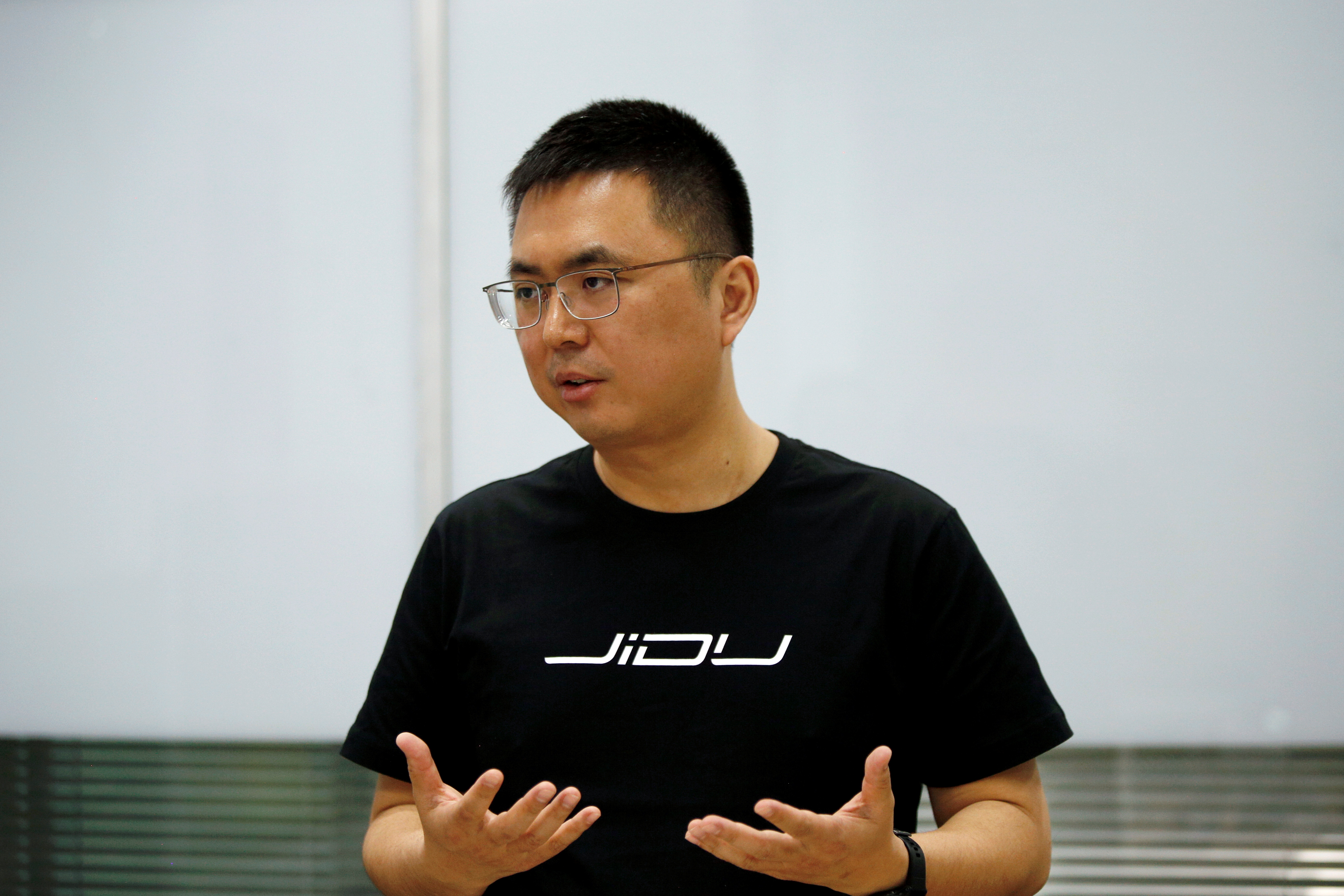 Jidu Auto CEO Xia Yiping attends an interview with Reuters in Beijing