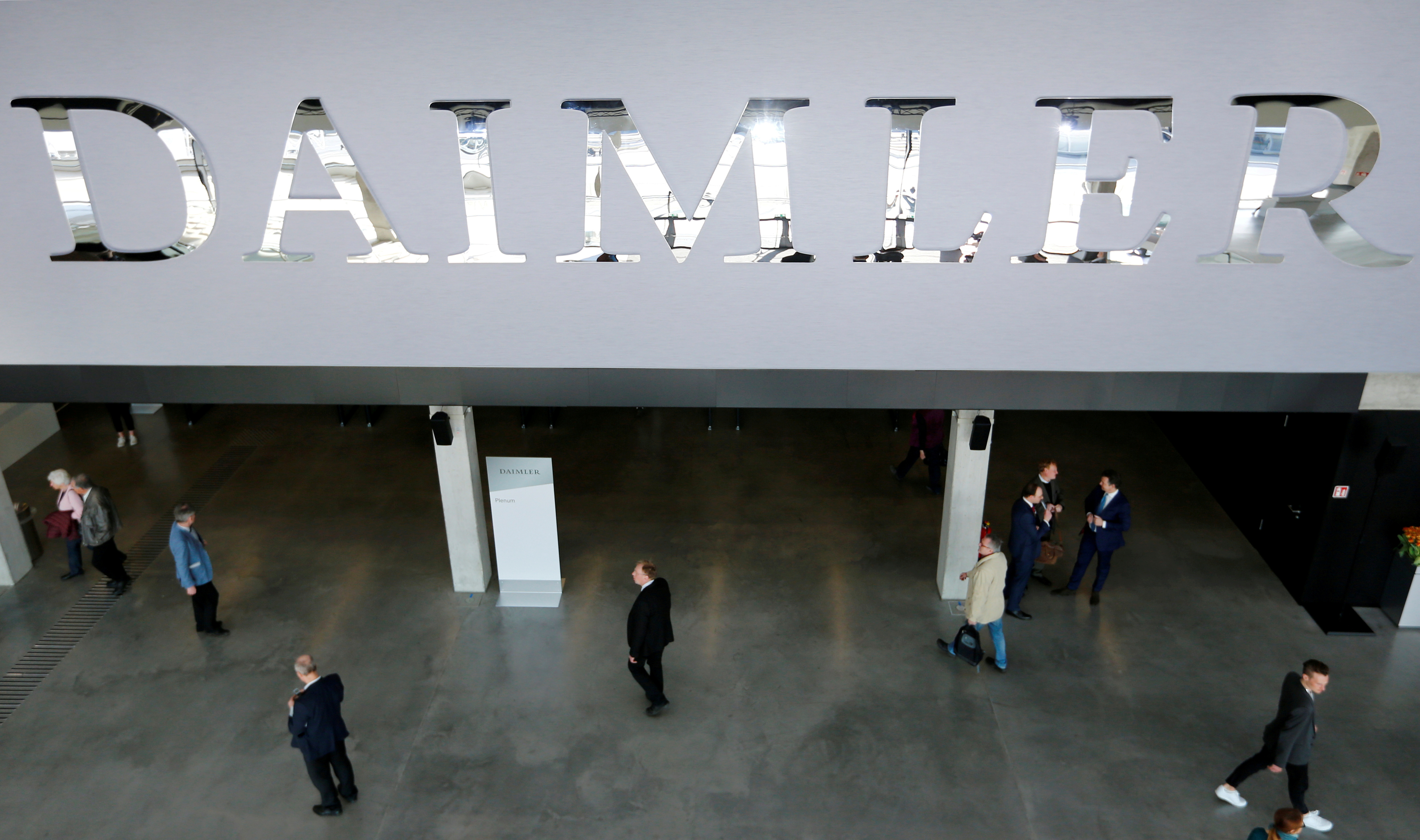The Daimler logo is seen before the Daimler annual shareholder meeting in Berlin, Germany, April 5, 2018. REUTERS/Hannibal Hanschke//File Photo