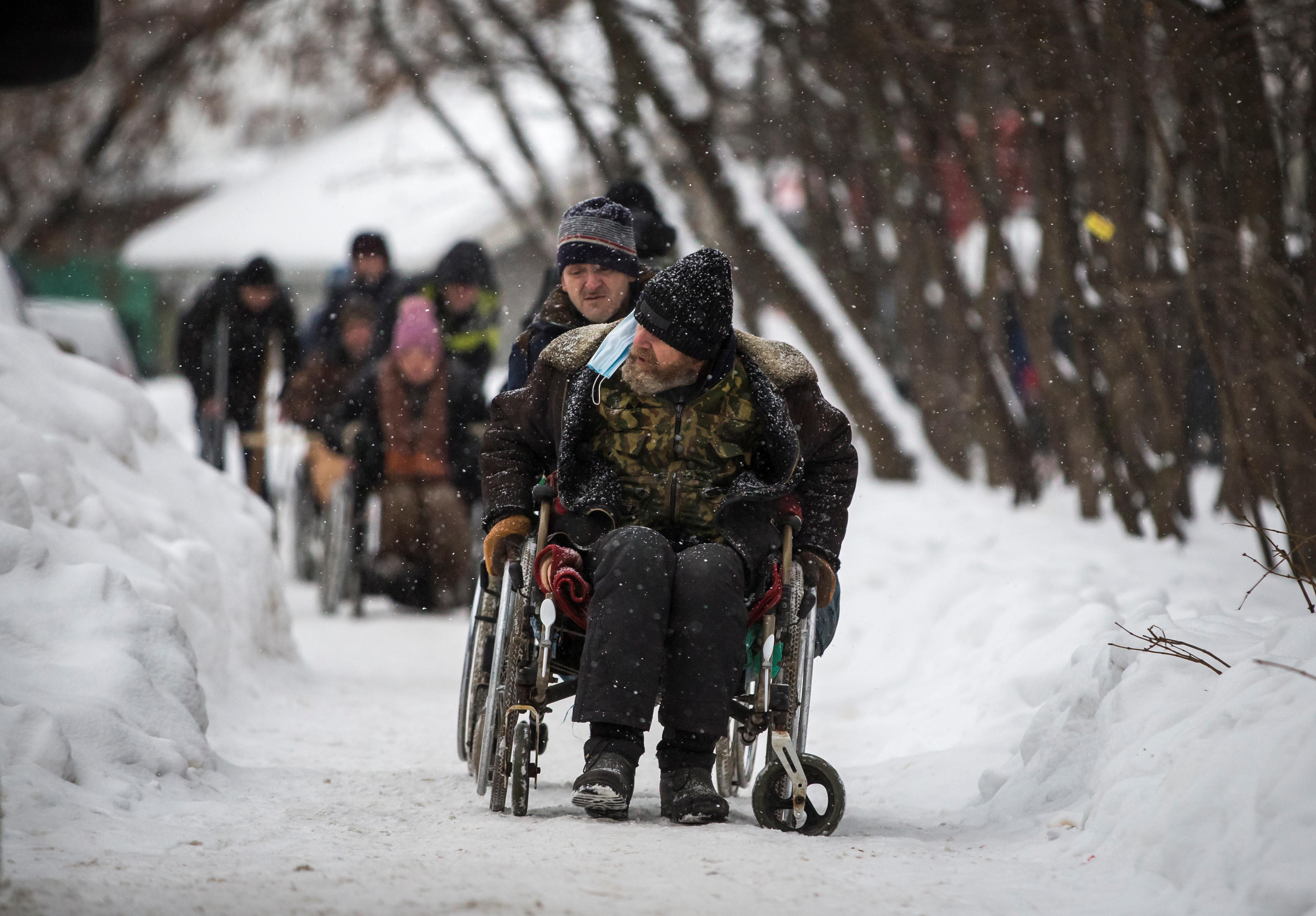 Moscow homeless shelter sees visitors triple in pandemic | Reuters