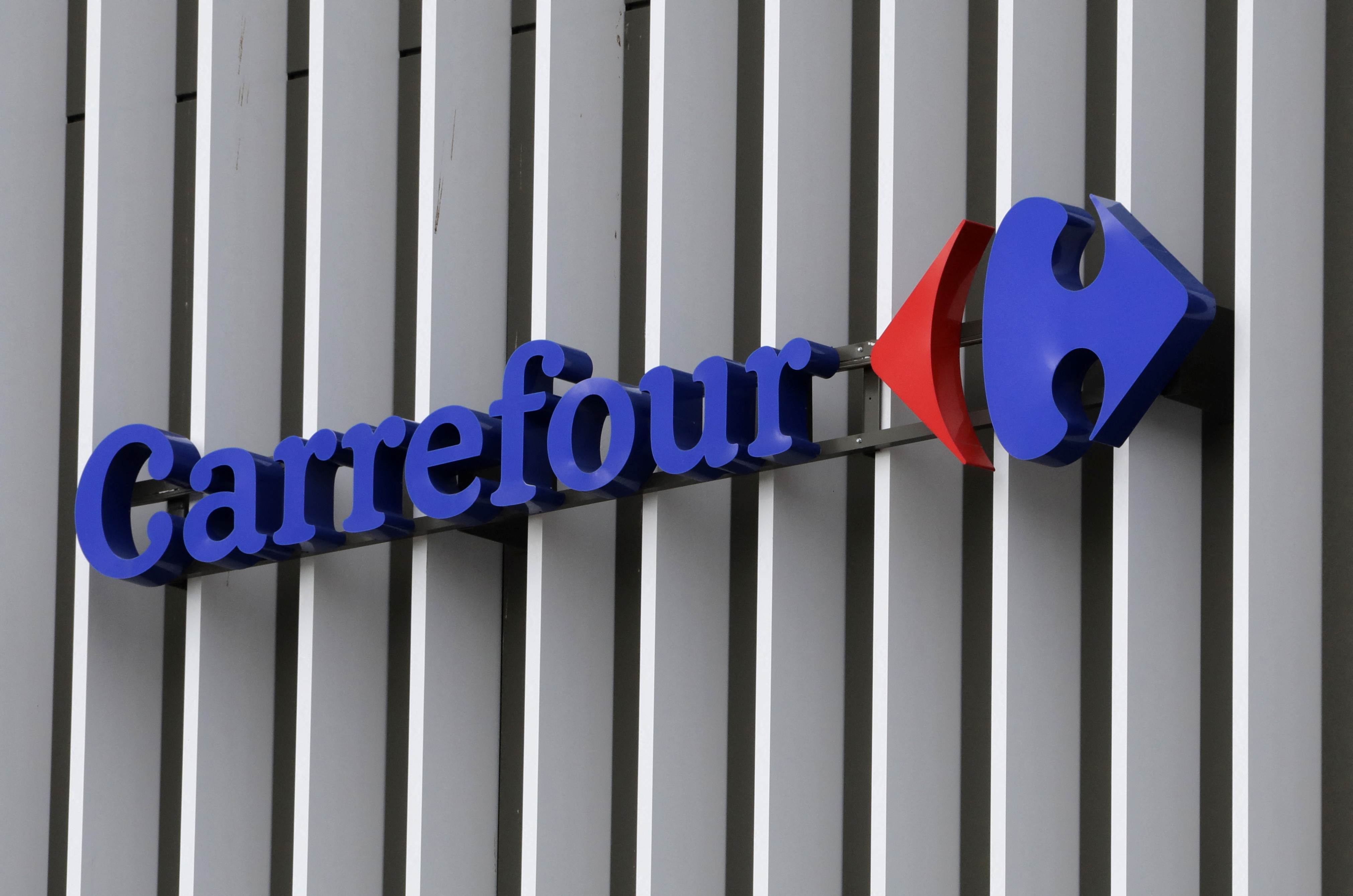 The logo of Carrefour is seen at a Carrefour Hypermarket store in Nice