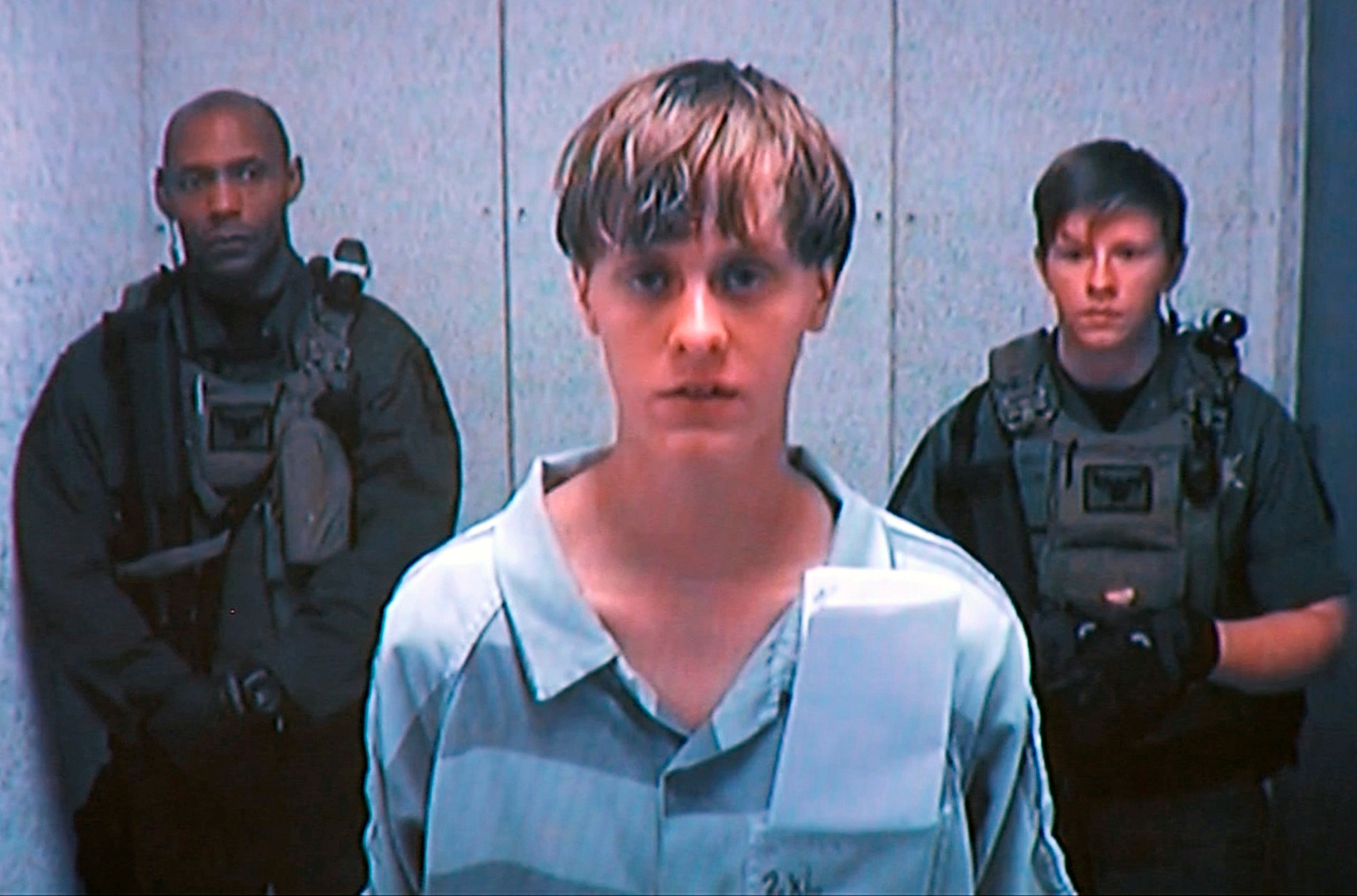 Dylann Storm Roof appears by closed-circuit television at his bond hearing in Charleston