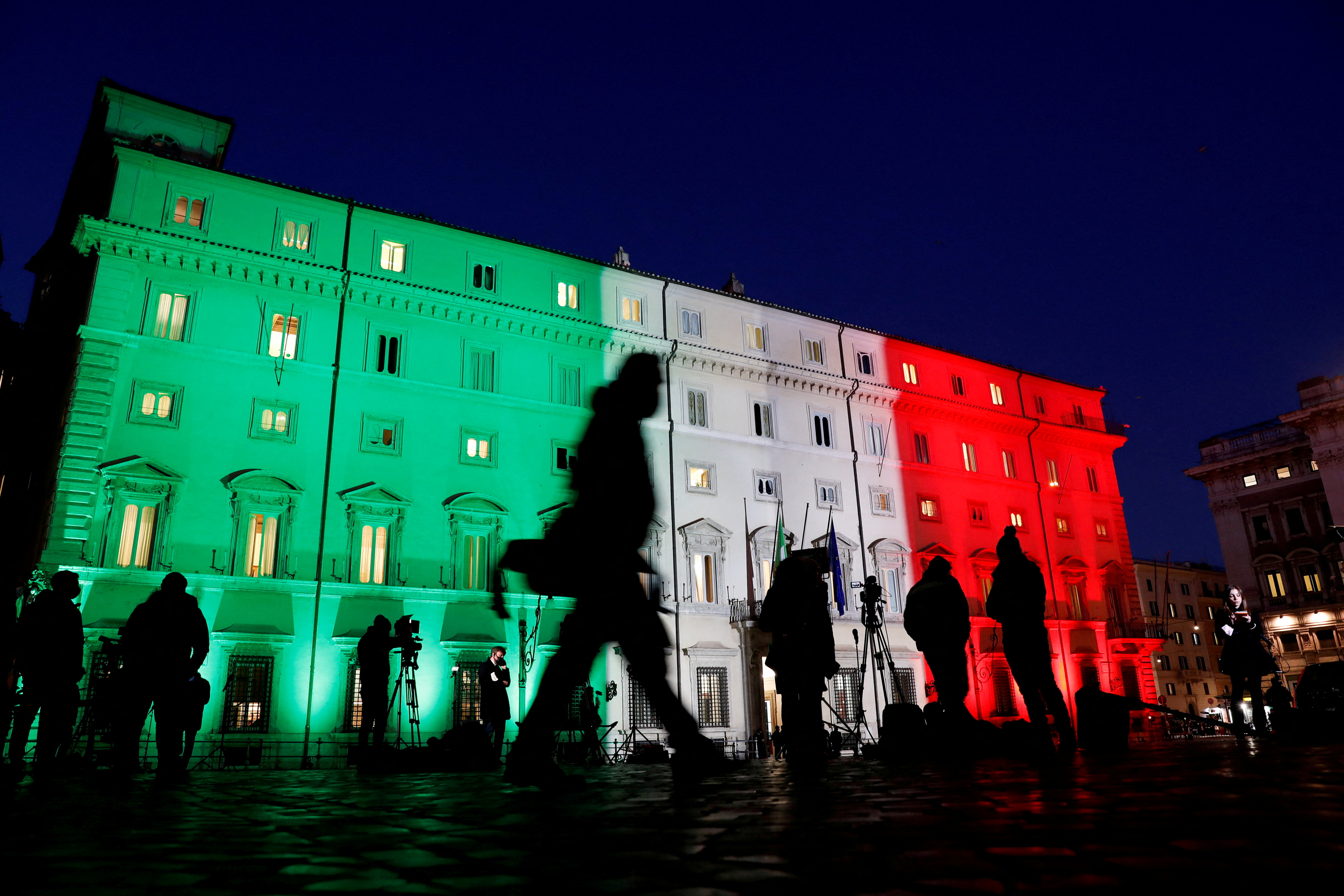 Rome's Palazzo Chigi lit up with the colours of the Italian flag