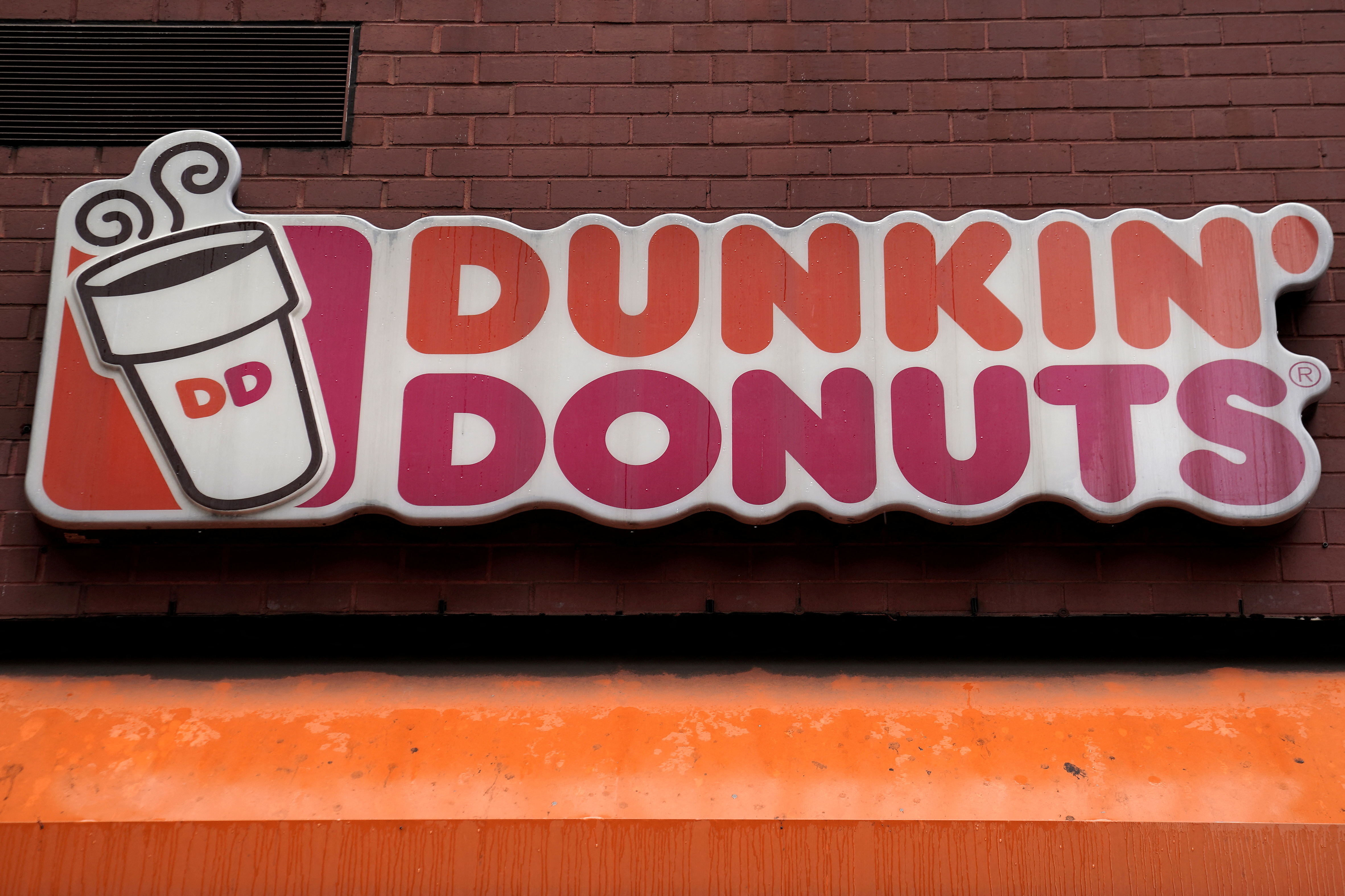 A Dunkin' Donuts logo is pictured