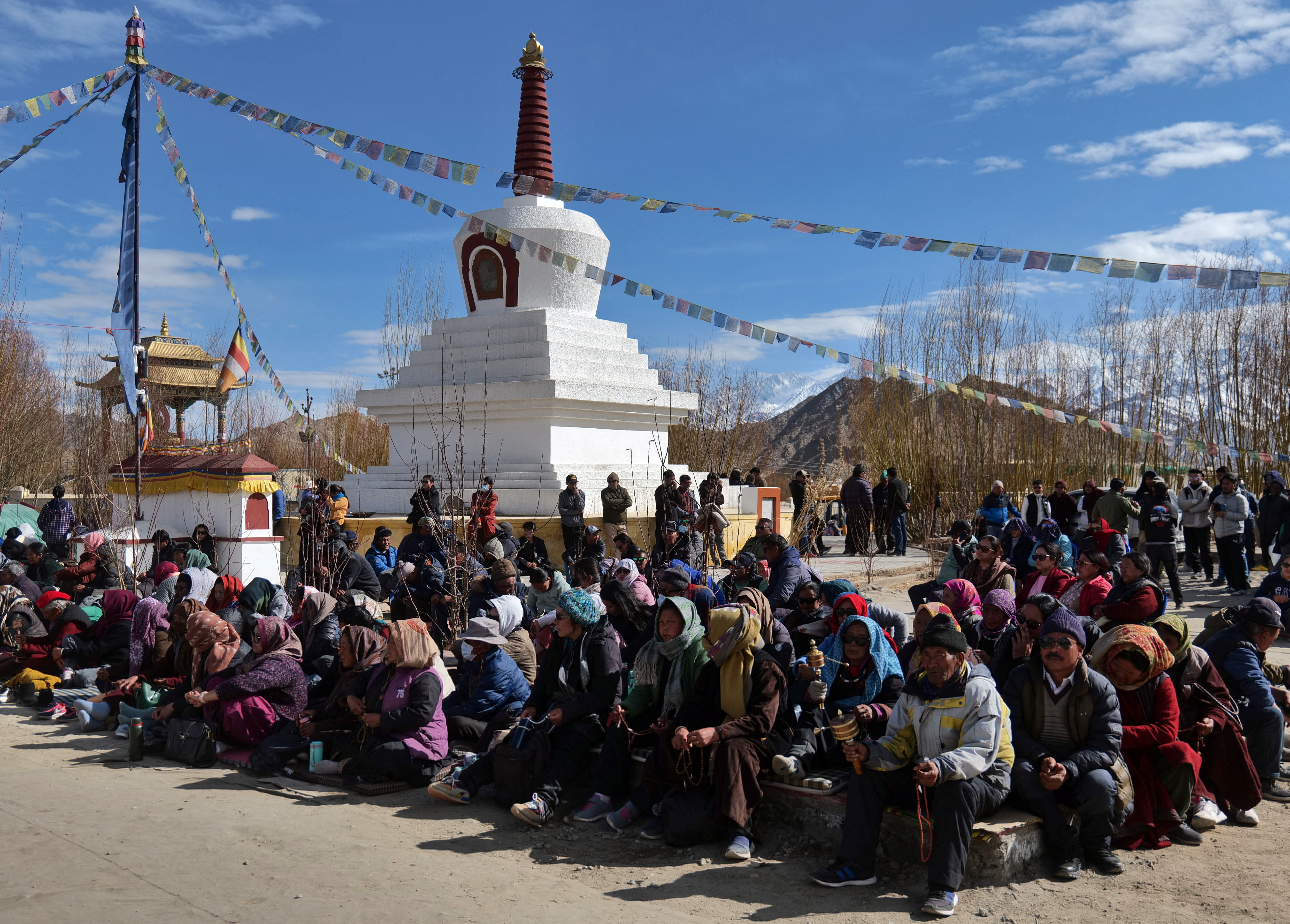 Demonstrators attend a sit-in protest demanding constitutional safeguards and statehood in Ladakh