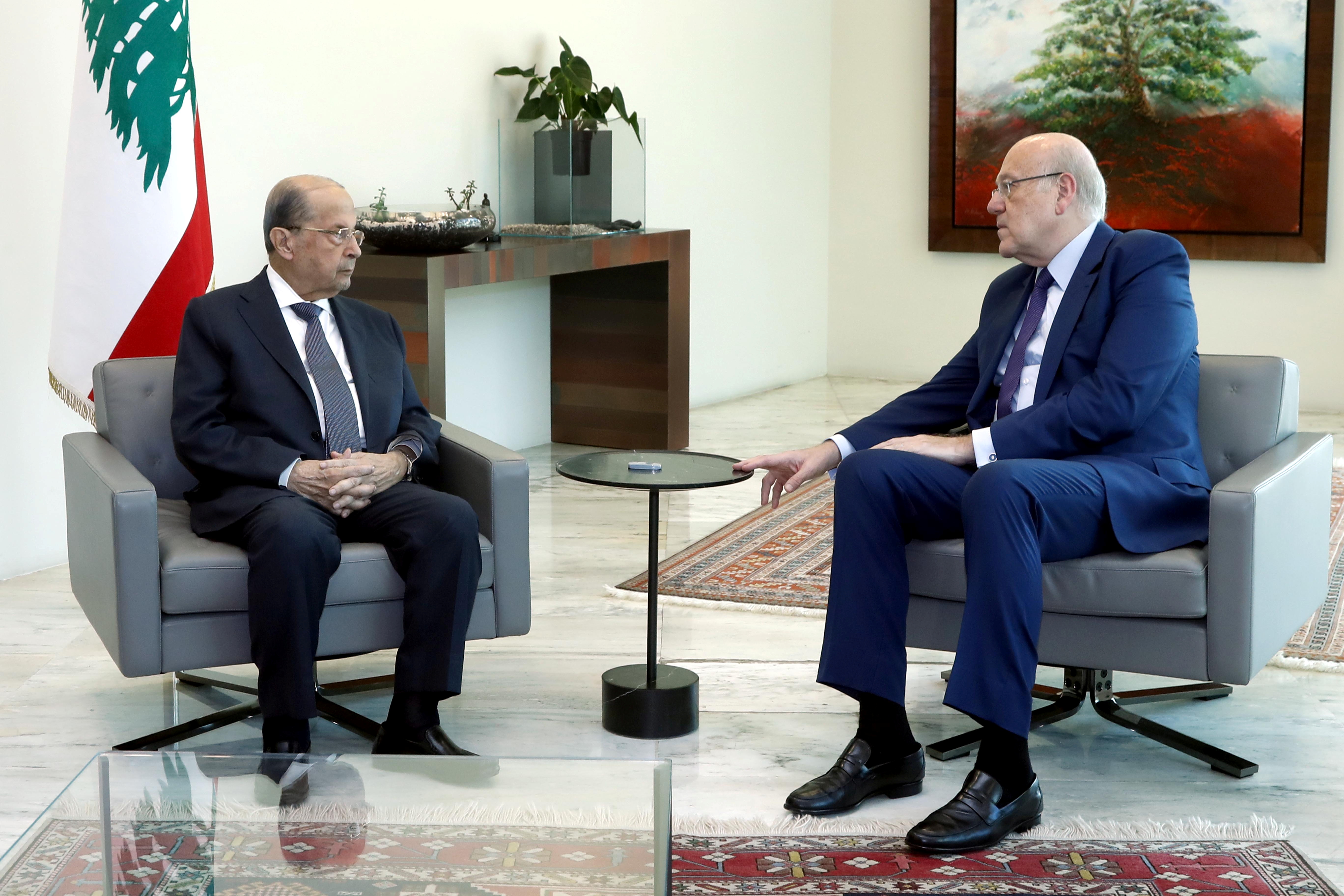 Lebanon's President Michel Aoun meets with Lebanese Prime Minister Najib Mikati at the presidential palace in Baabda