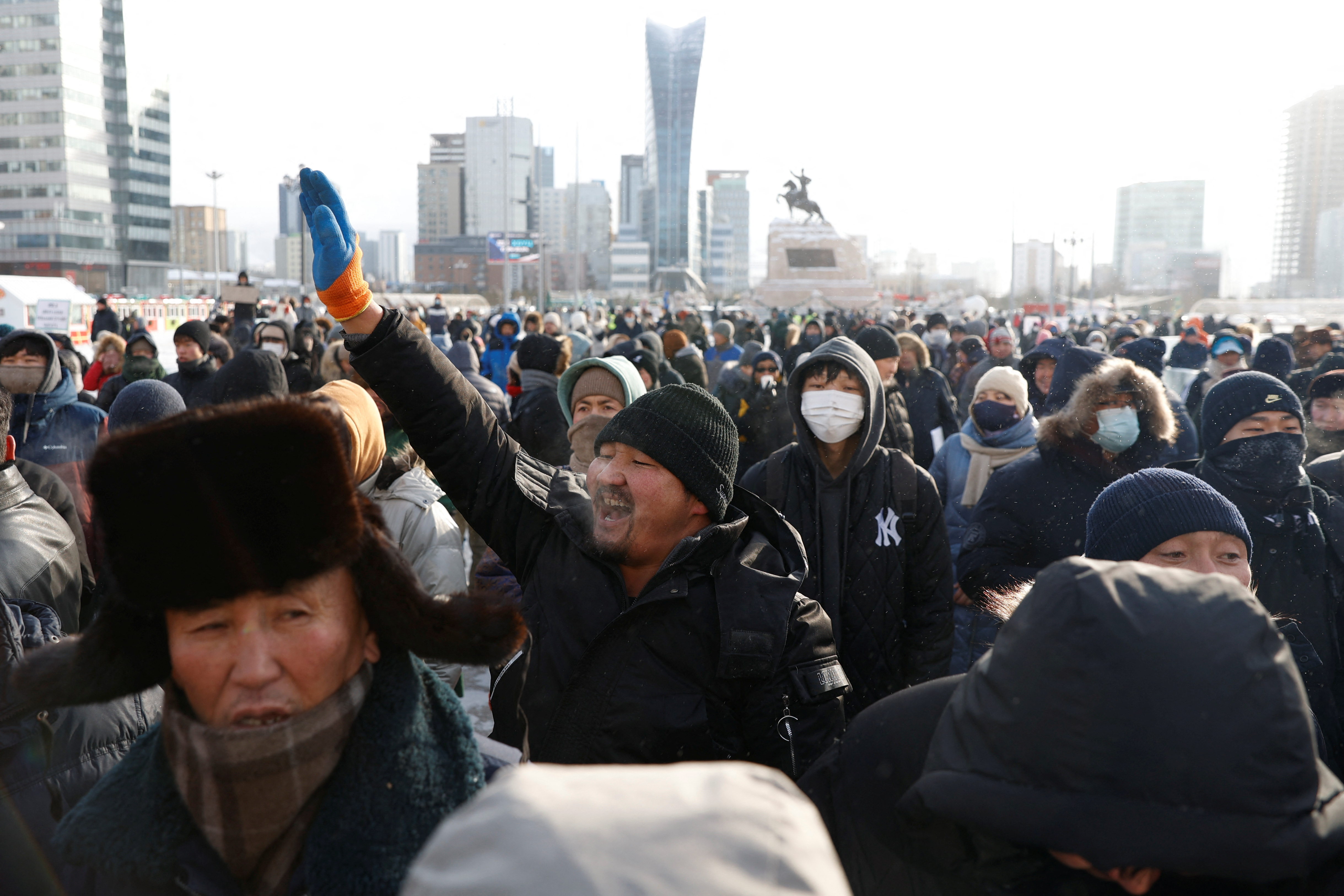People take part in a demonstration against government corruption at Sukhbaatar Square in Ulaanbaatar
