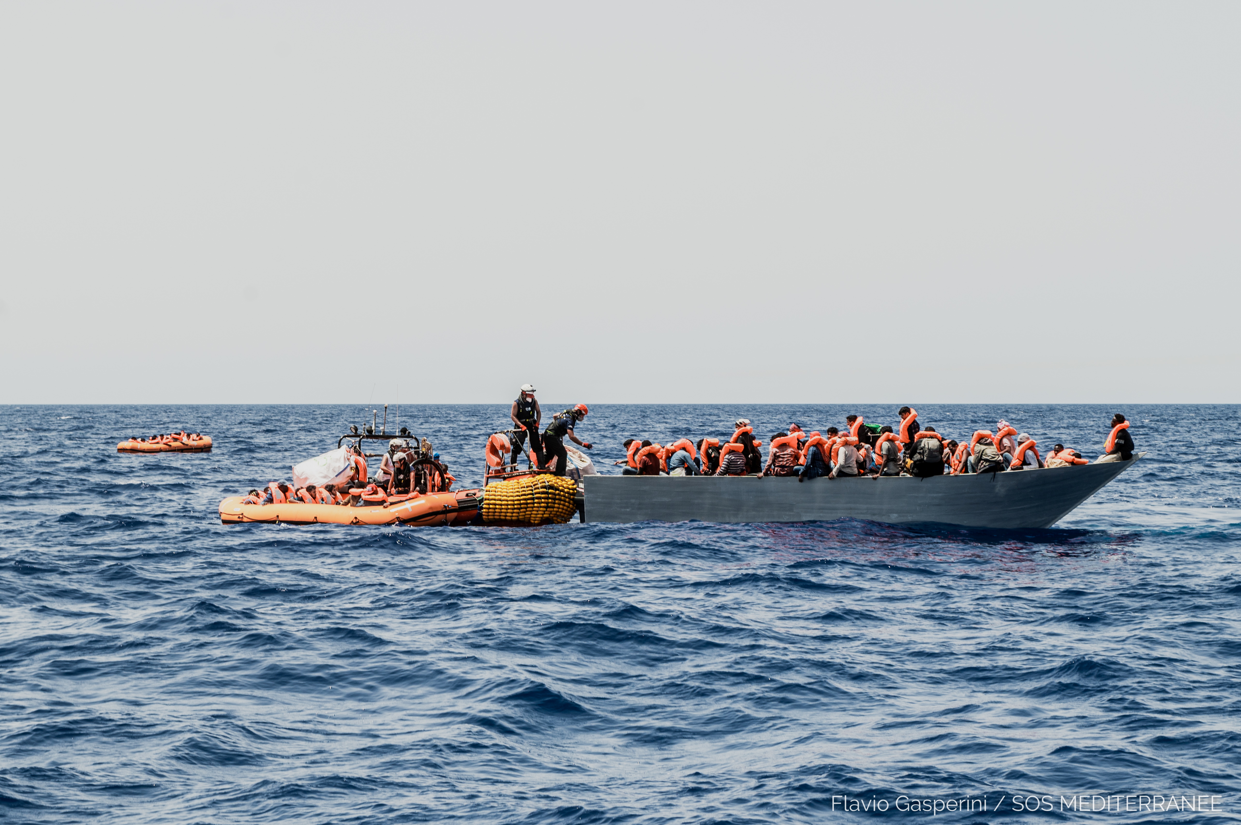 Migrants are rescued during a search and rescue (SAR) operation in the Mediterranean Sea, July 4, 2021. Picture taken July 4, 2021. Flavio Gasperini/SOS Mediterranee/Handout via REUTERS ATTENTION EDITORS - THIS IMAGE HAS BEEN SUPPLIED BY A THIRD PARTY. NO RESALES. NO ARCHIVES. MANDATORY CREDIT