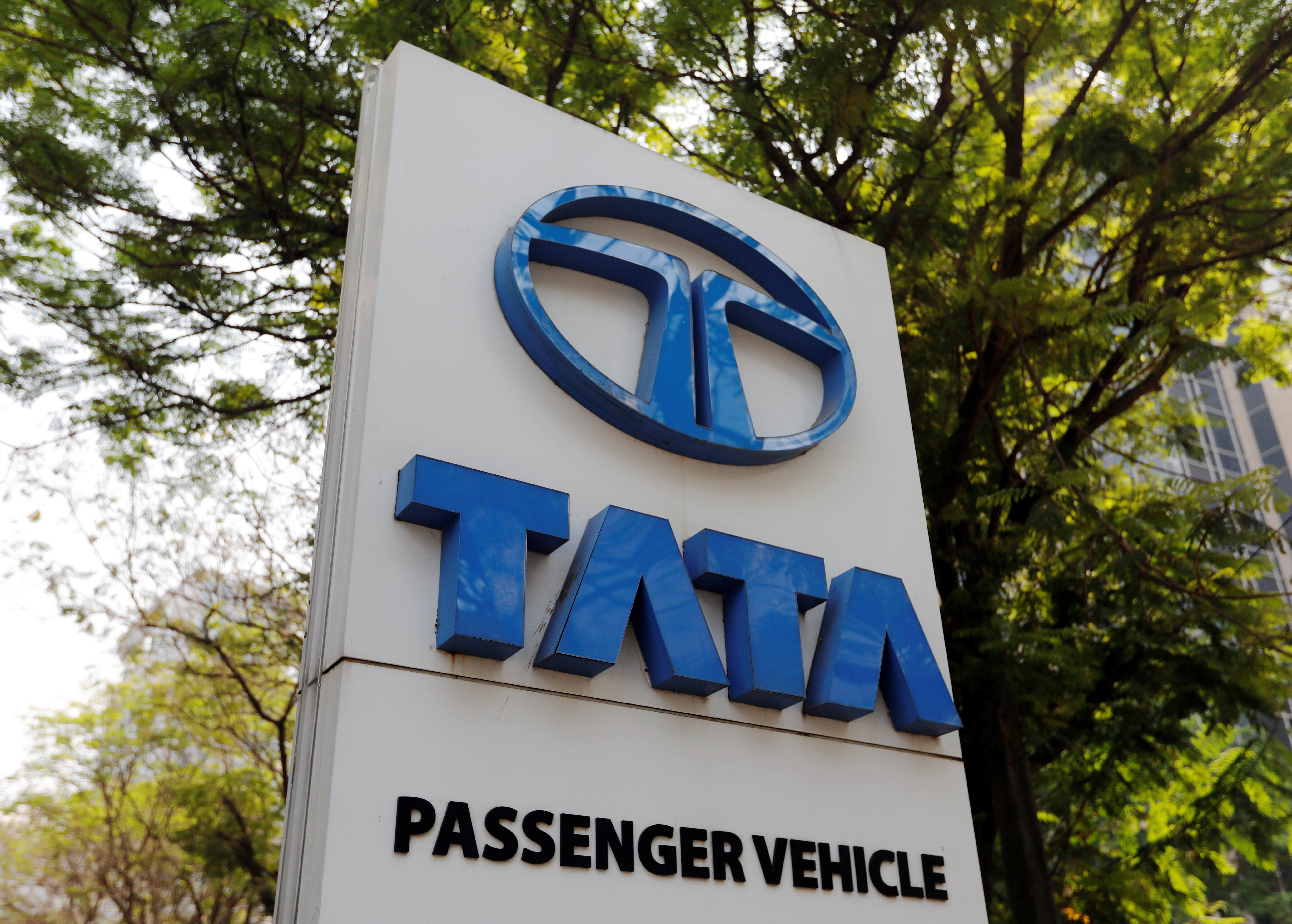 A Tata Motors logo is pictured outside the company showroom in Mumbai