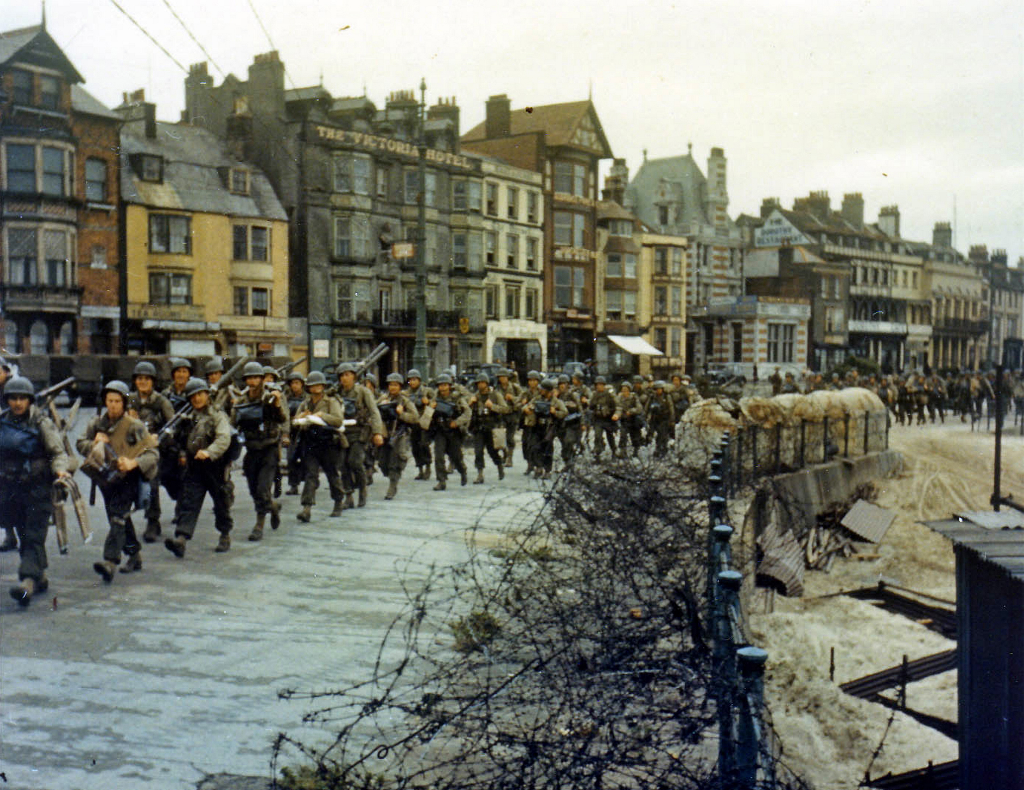 Handout photo of the 2nd Battalion US Army Rangers march to their landing craft in Weymouth