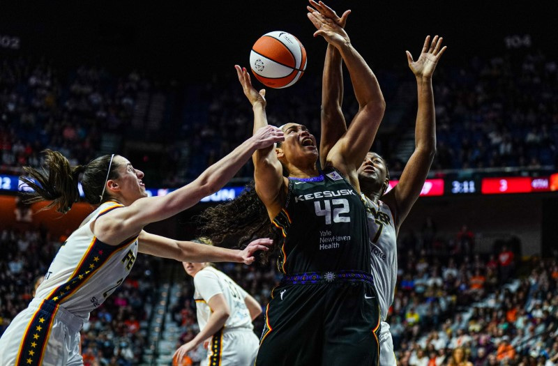 Sun cool Fever in Clark's WNBA debut | Reuters