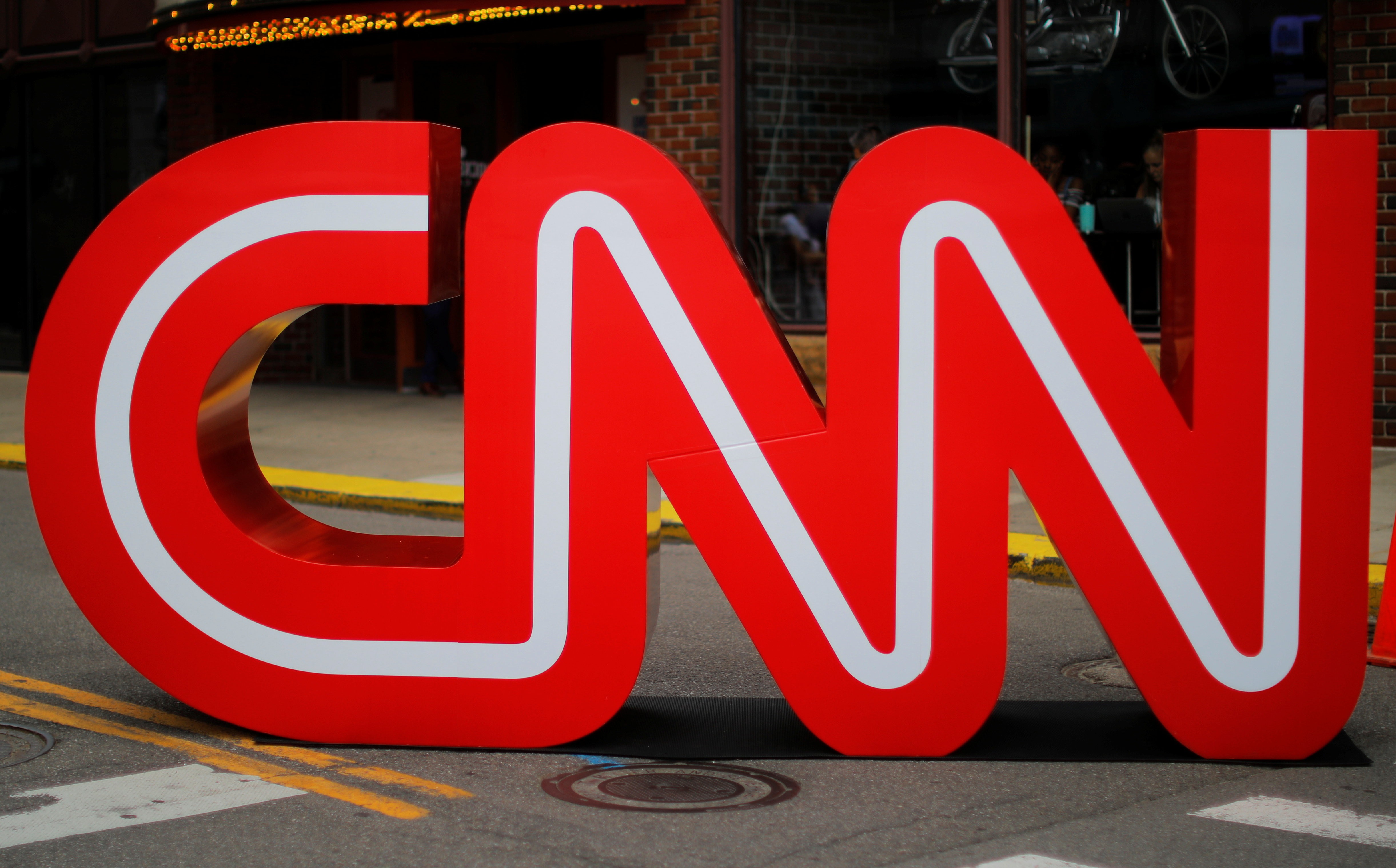 FLE PHOTO: The CNN logo stands outside the venue of the second Democratic 2020 U.S. presidential candidates debate, in the Fox Theater in Detroit, Michigan, U.S., July 30, 2019.   REUTERS/Brian Snyder