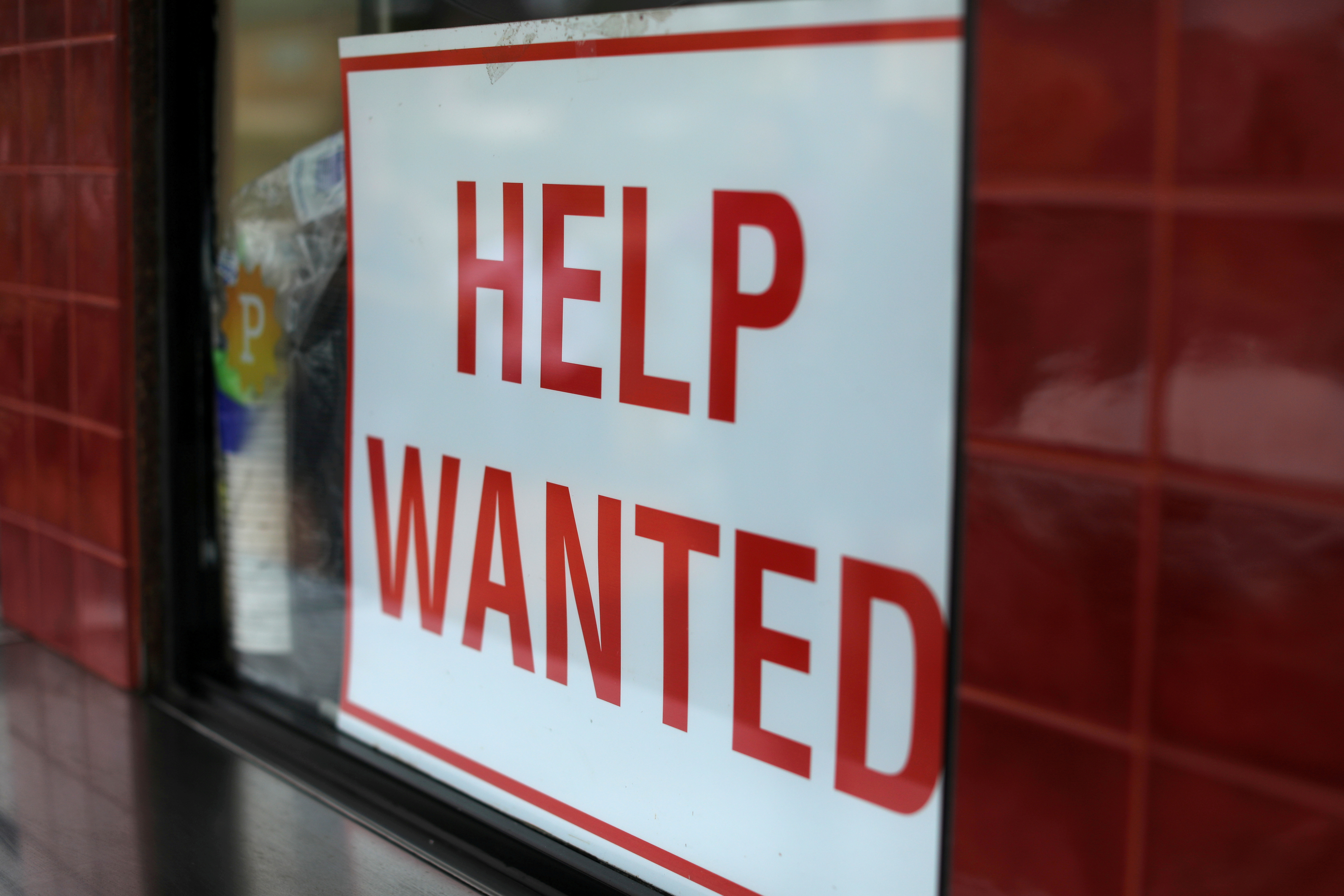 FILE PHOTO: Help Wanted sign at taco stand in California