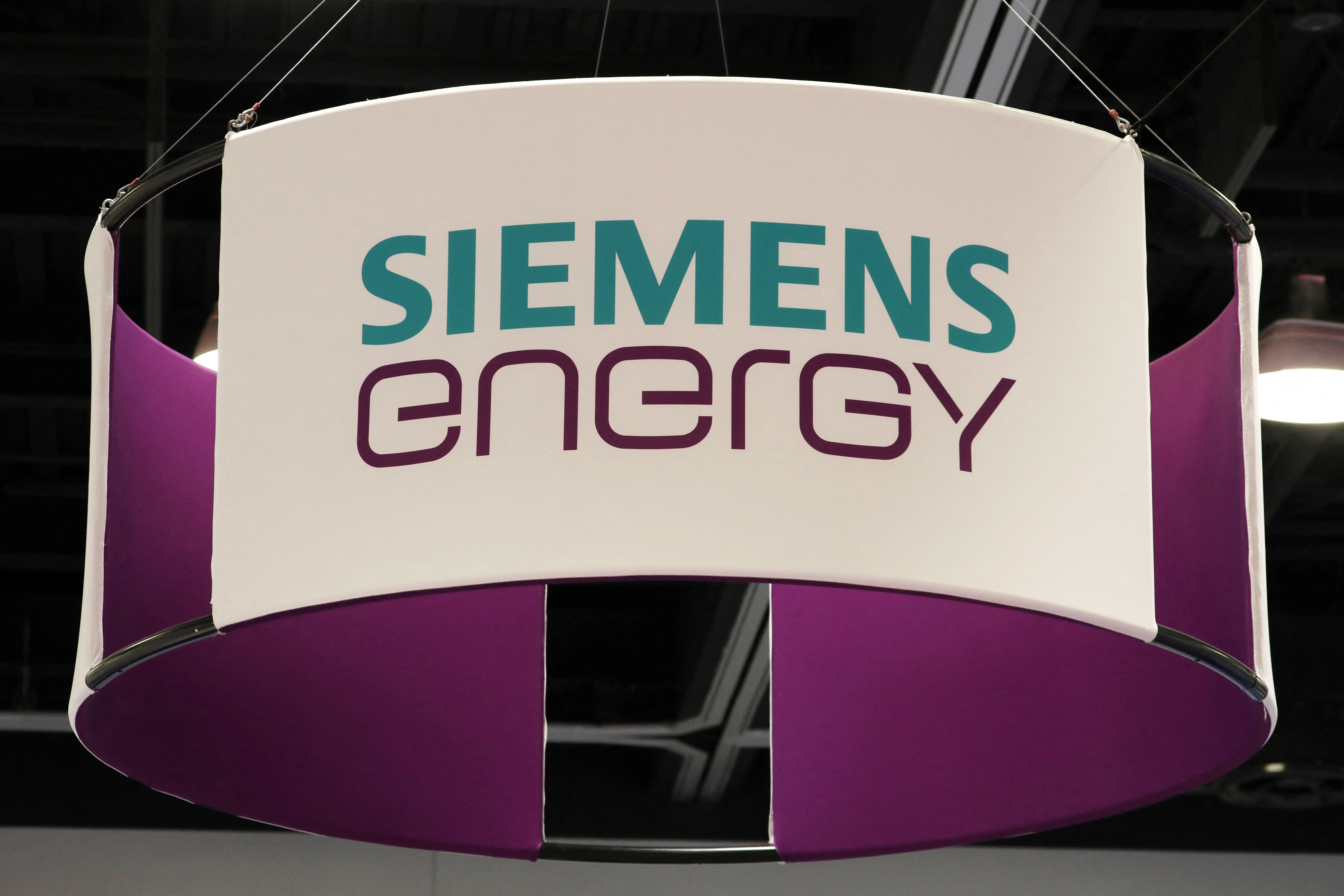 The logo of energy technology company Siemens Energy is displayed during the LNG 2023 energy trade show in Vancouver
