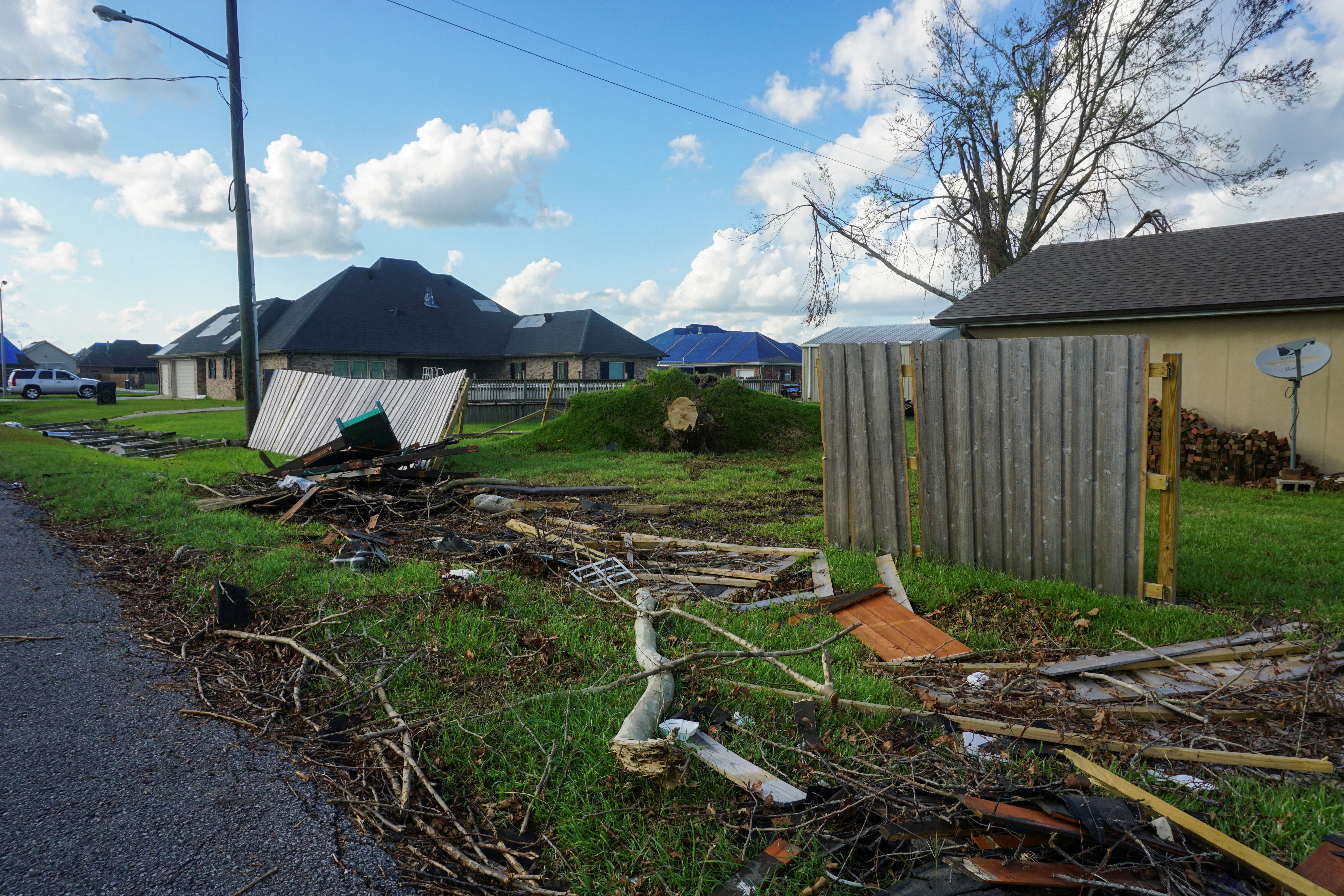 Damage to homes is seen following Hurricane Ida in Houma, Louisiana, U.S. September 20, 2021. REUTERS/Liz Hampton