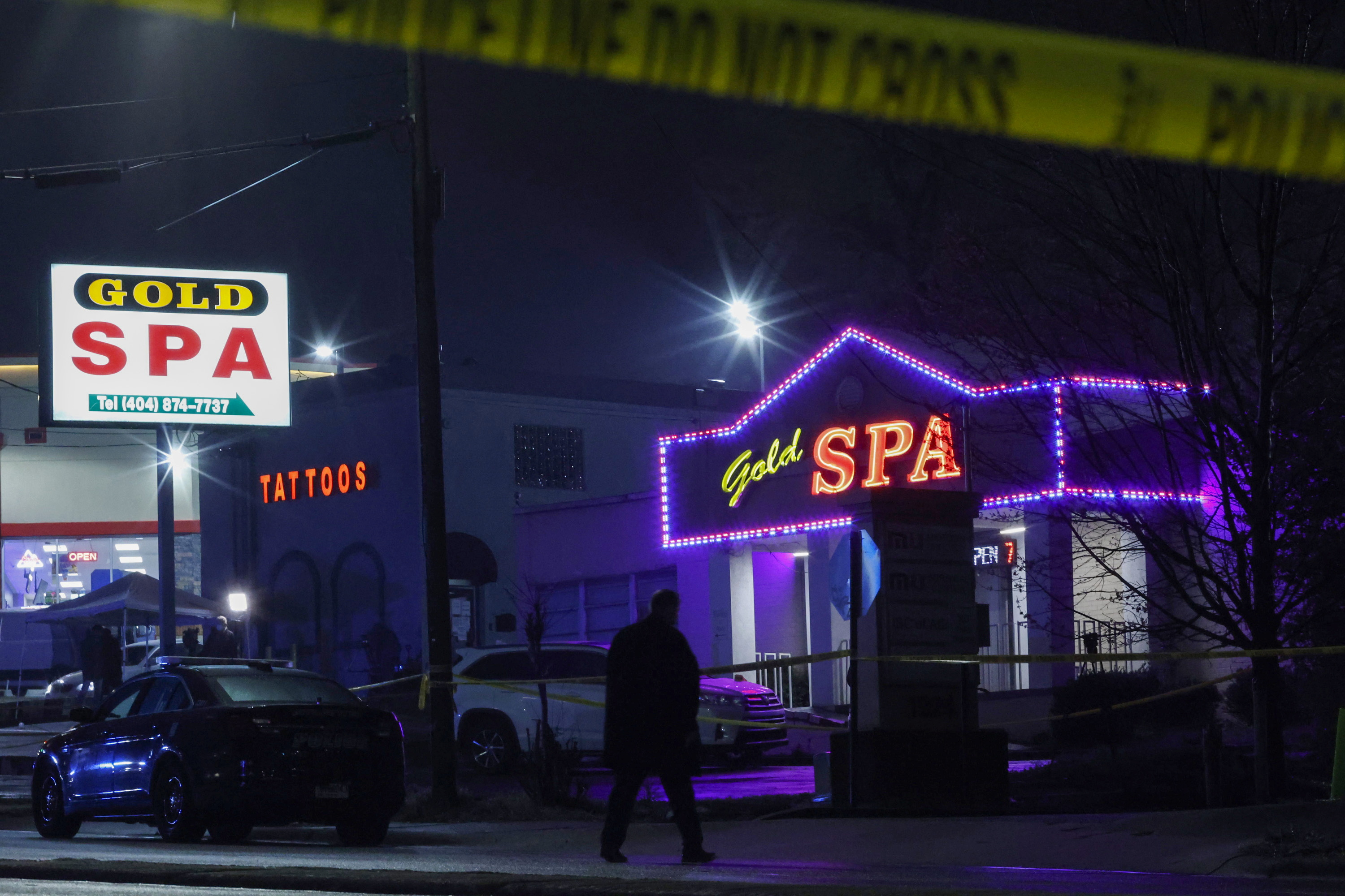 Crime scene tape surrounds Aromatherapy Spa after deadly shootings at three day spas, in Atlanta