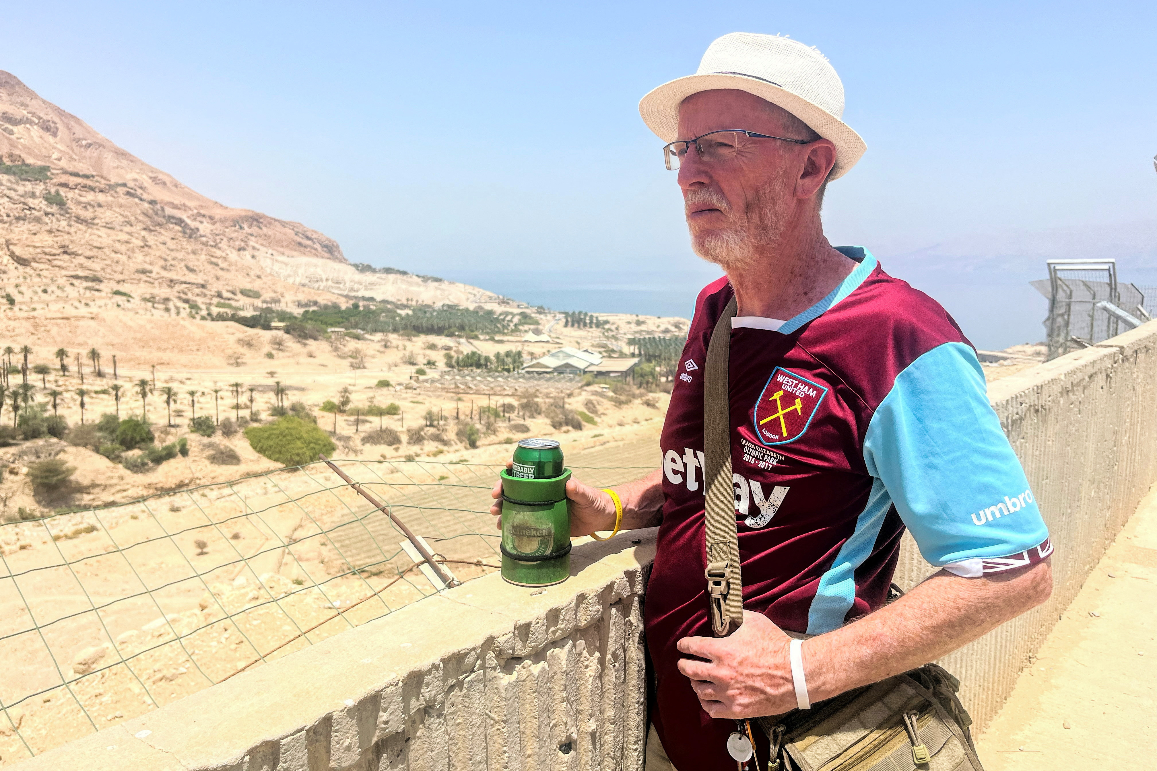 Thomas Hand, the Irish-born father of 9-year-old Emily Hand who was taken hostage by Hamas on October 7 and was returned in a hostages-prisoners swap deal, looks out towards the desert from his temporary accommodation in Ein Gedi