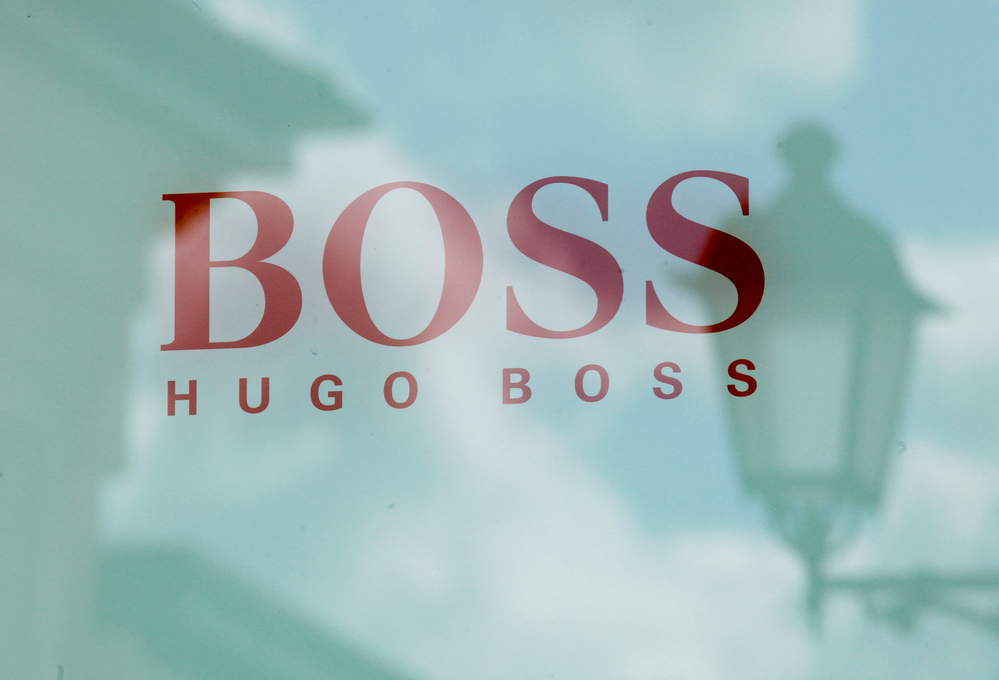 Hugo Boss store logo is seen on a shopping center at the outlet village Belaya Dacha outside Moscow