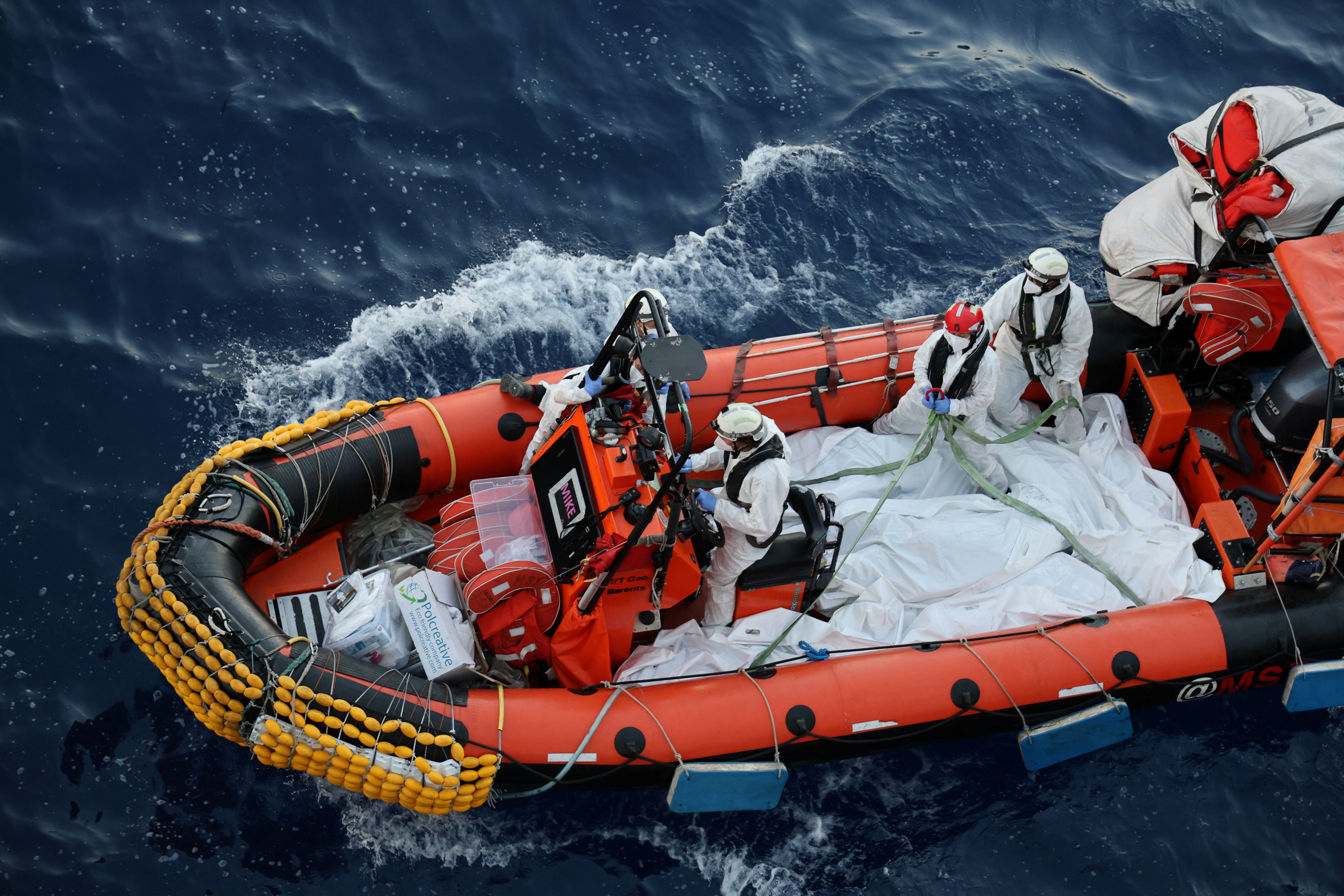 Handout image shows body bags of migrants retrived from the Mediterranean sea