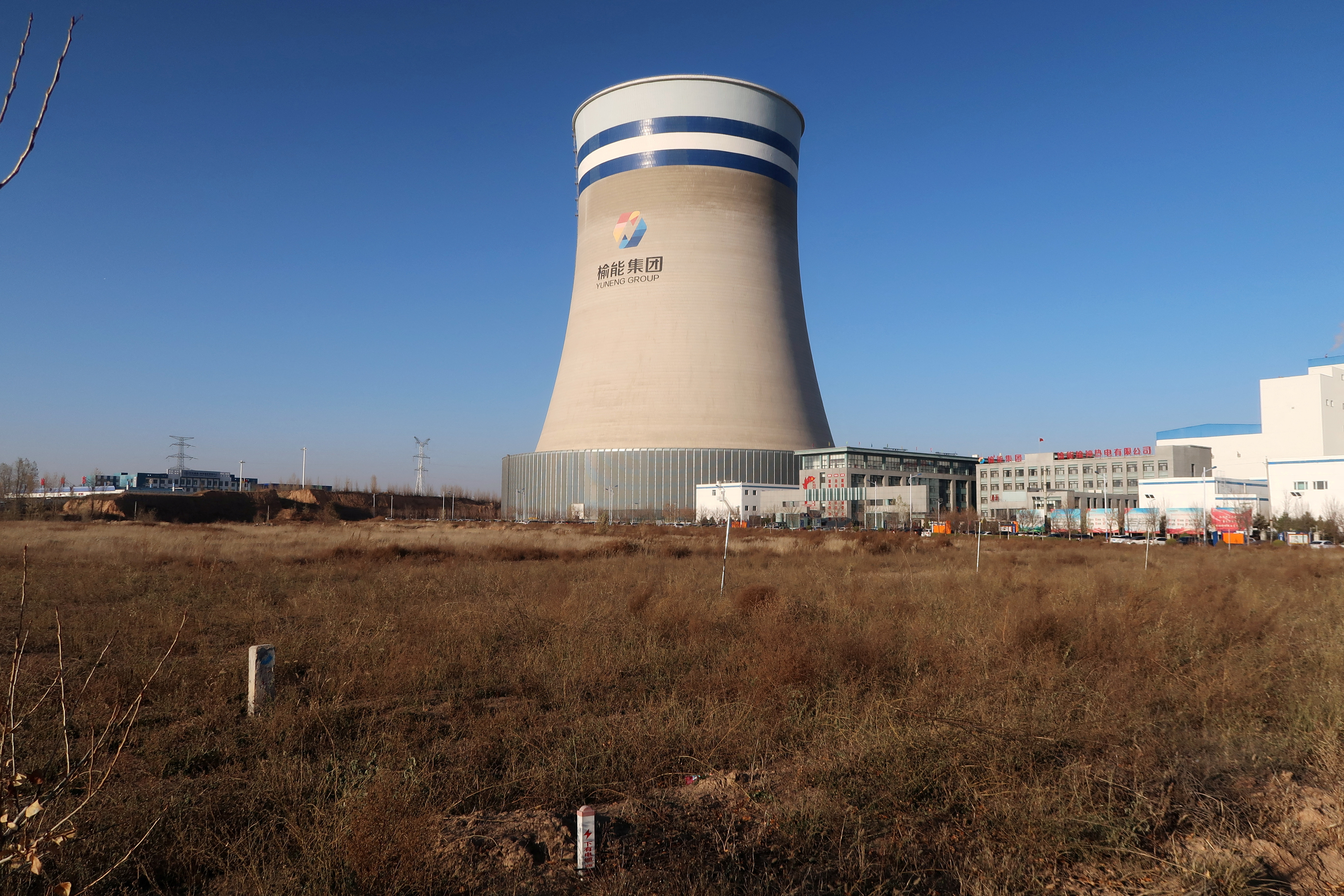 Cooling tower stands at a thermal power plant in Yulin