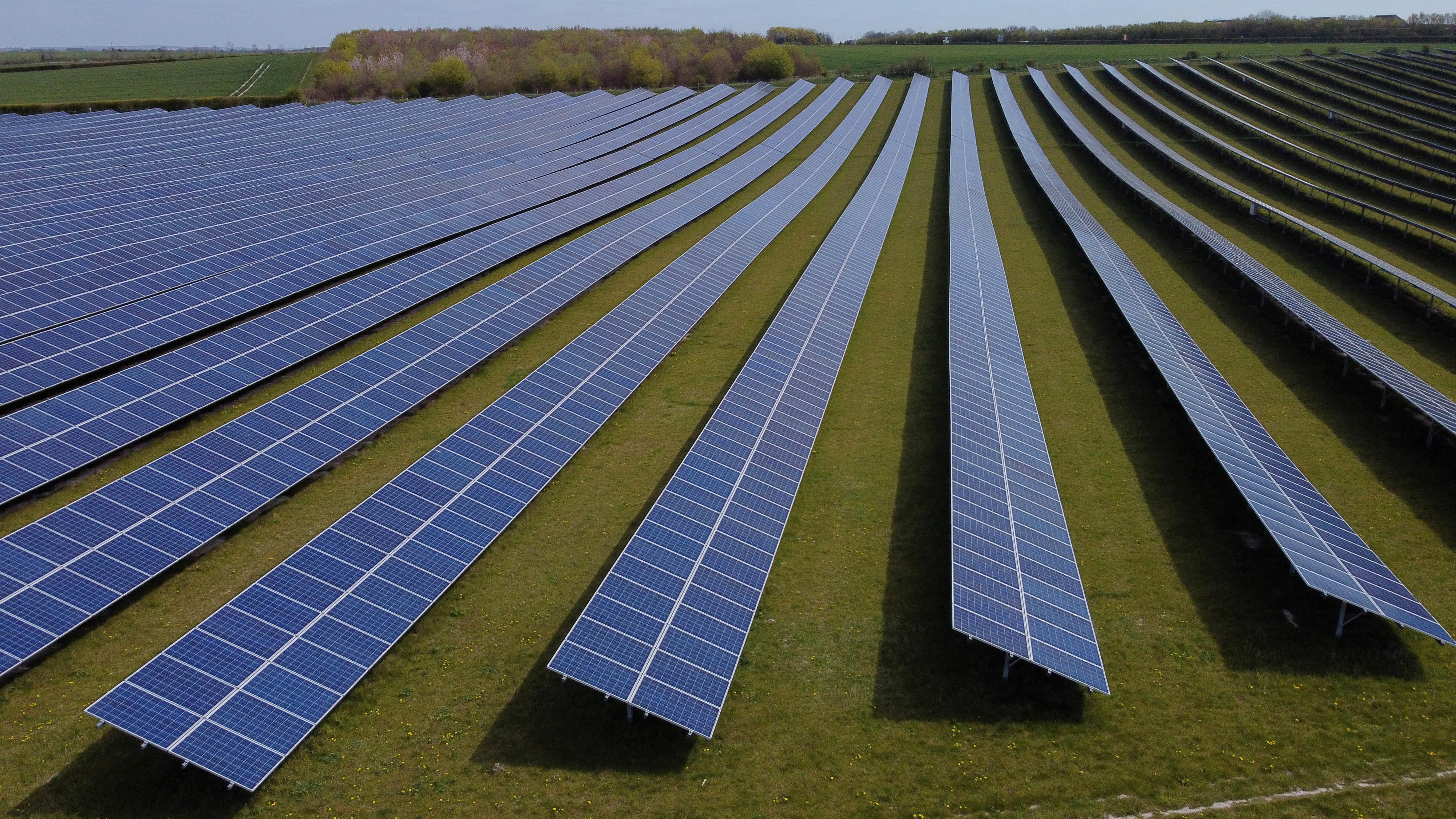 A field of solar panels is seen near Royston, Britain