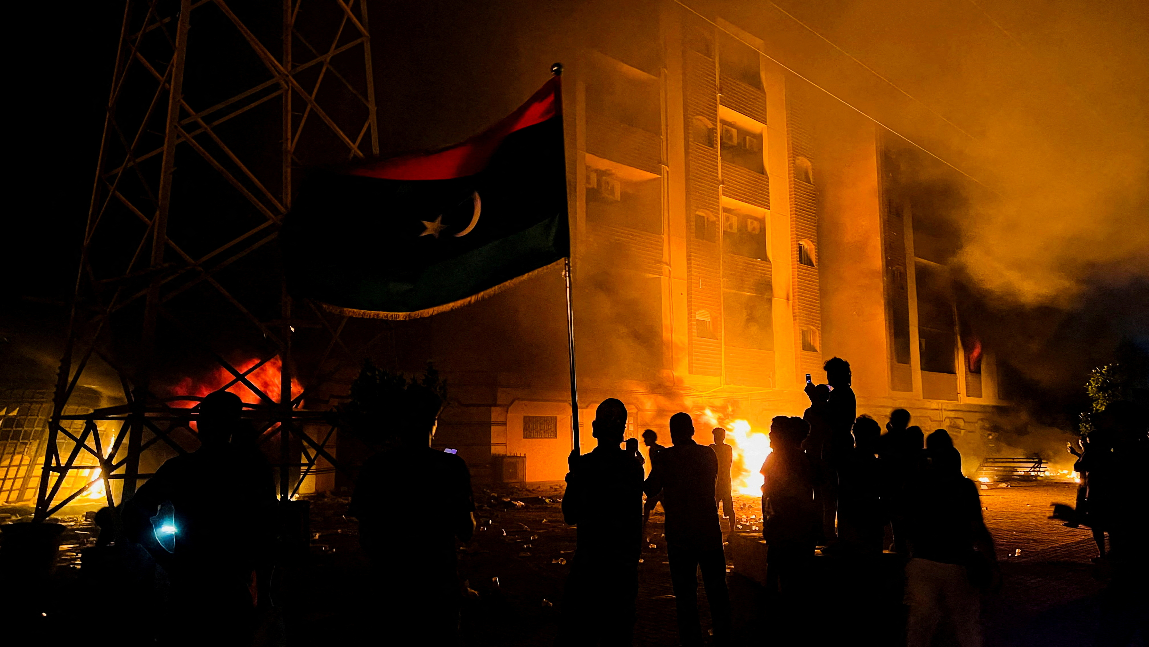 Protesters set fire to the Libyan parliament building after protests against the failure of the government in Tobruk
