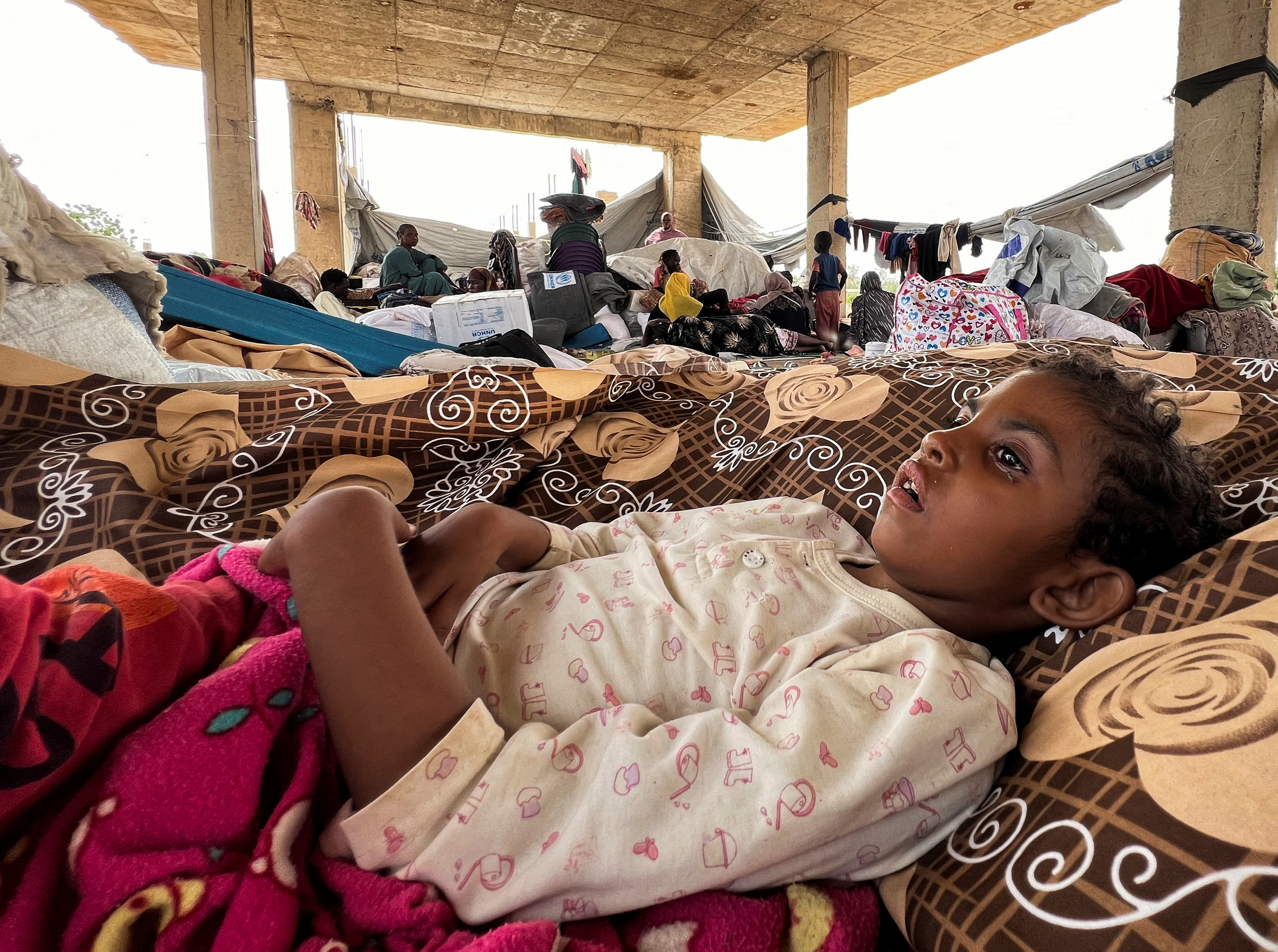 Families displaced by RSF advances in Sudan's El Gezira and Sennar states shelter at the Omar ibn al-Khattab displacement site, Kassala state