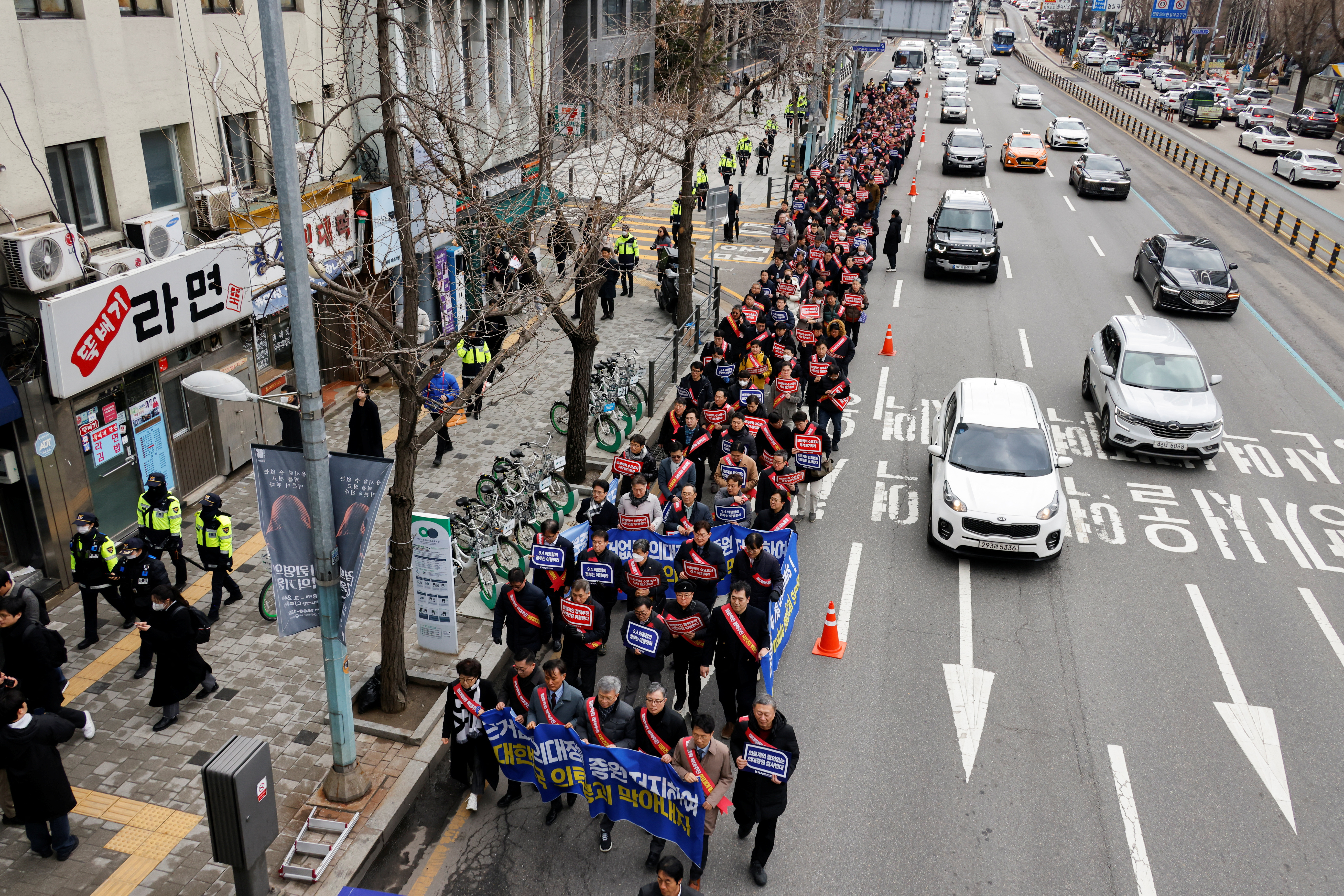 South Korean doctors march to protest against the government's medical policy in Seoul