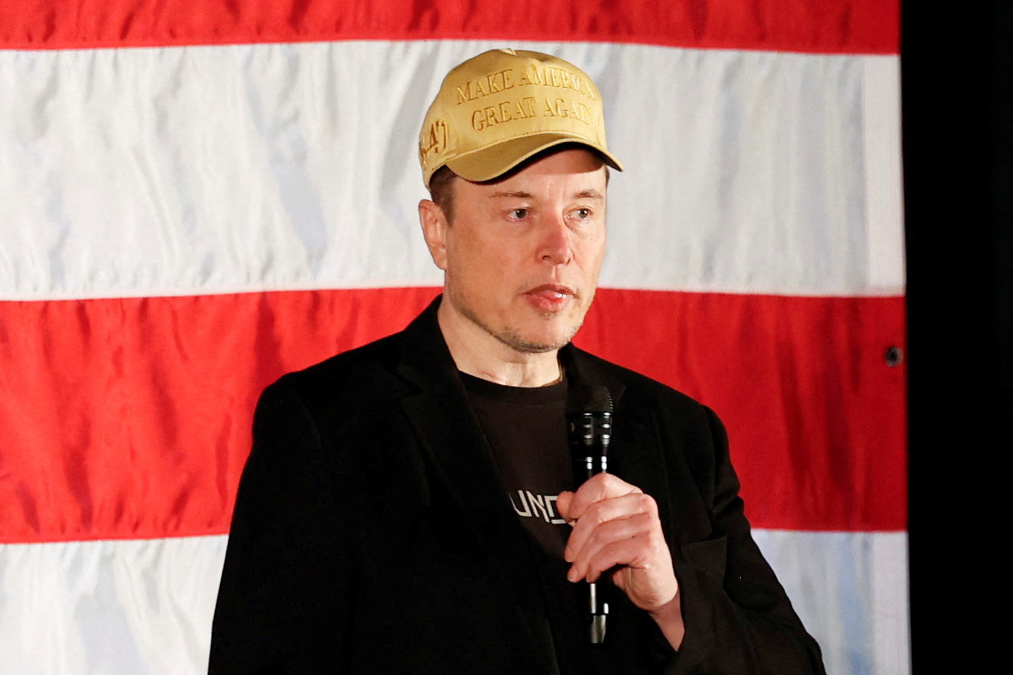 Tesla CEO and X owner Elon Musk speaks about voting during an America PAC Town Hall, in Folsom