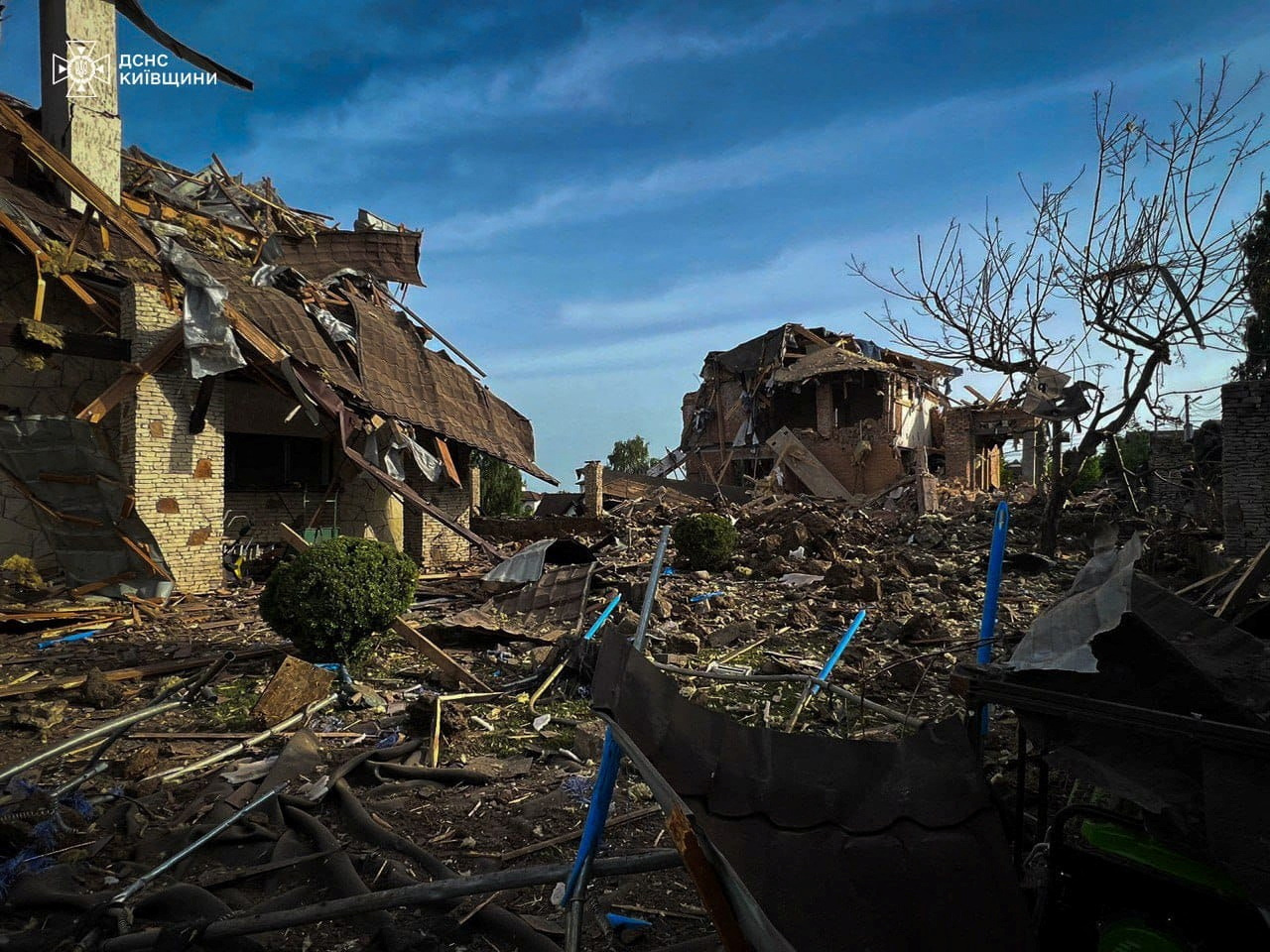 Russia missile attack on Kyiv region injures two, damages houses ...