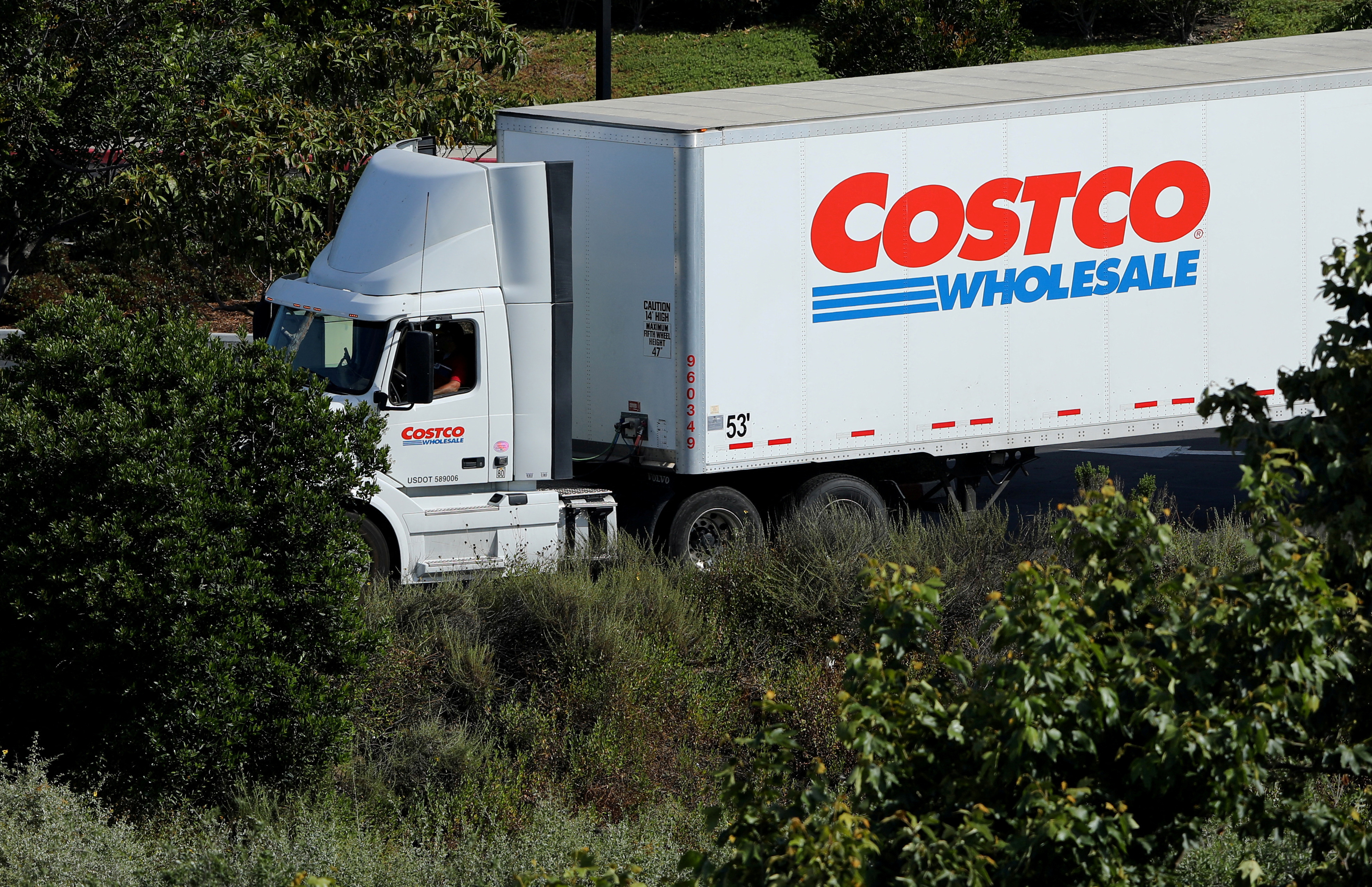 A Costco truck makes a deliver to a Costco store in Carlsbad, California