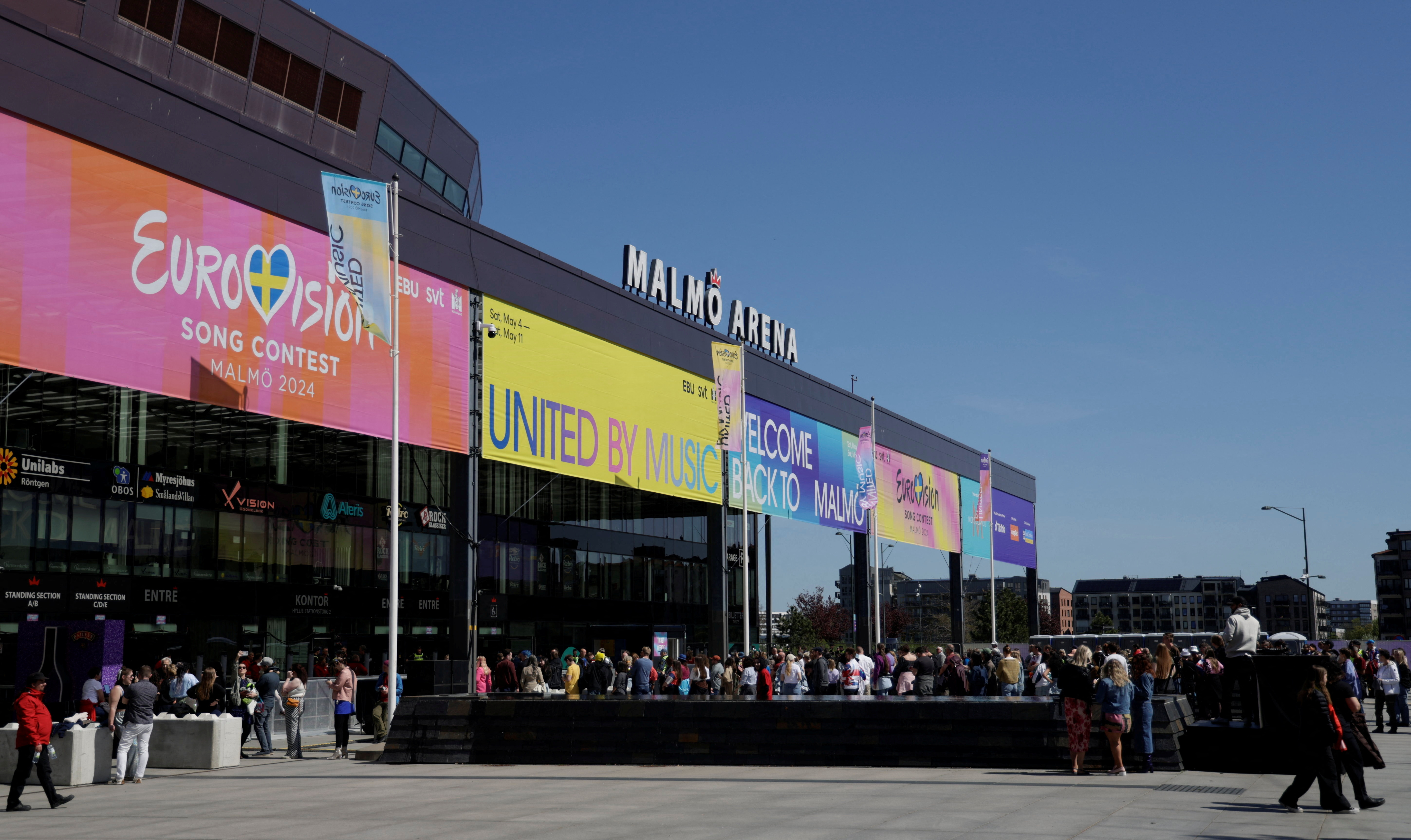 Fans queue for a dress rehearsal for the Eurovision Song Contest outside the Malmo Arena