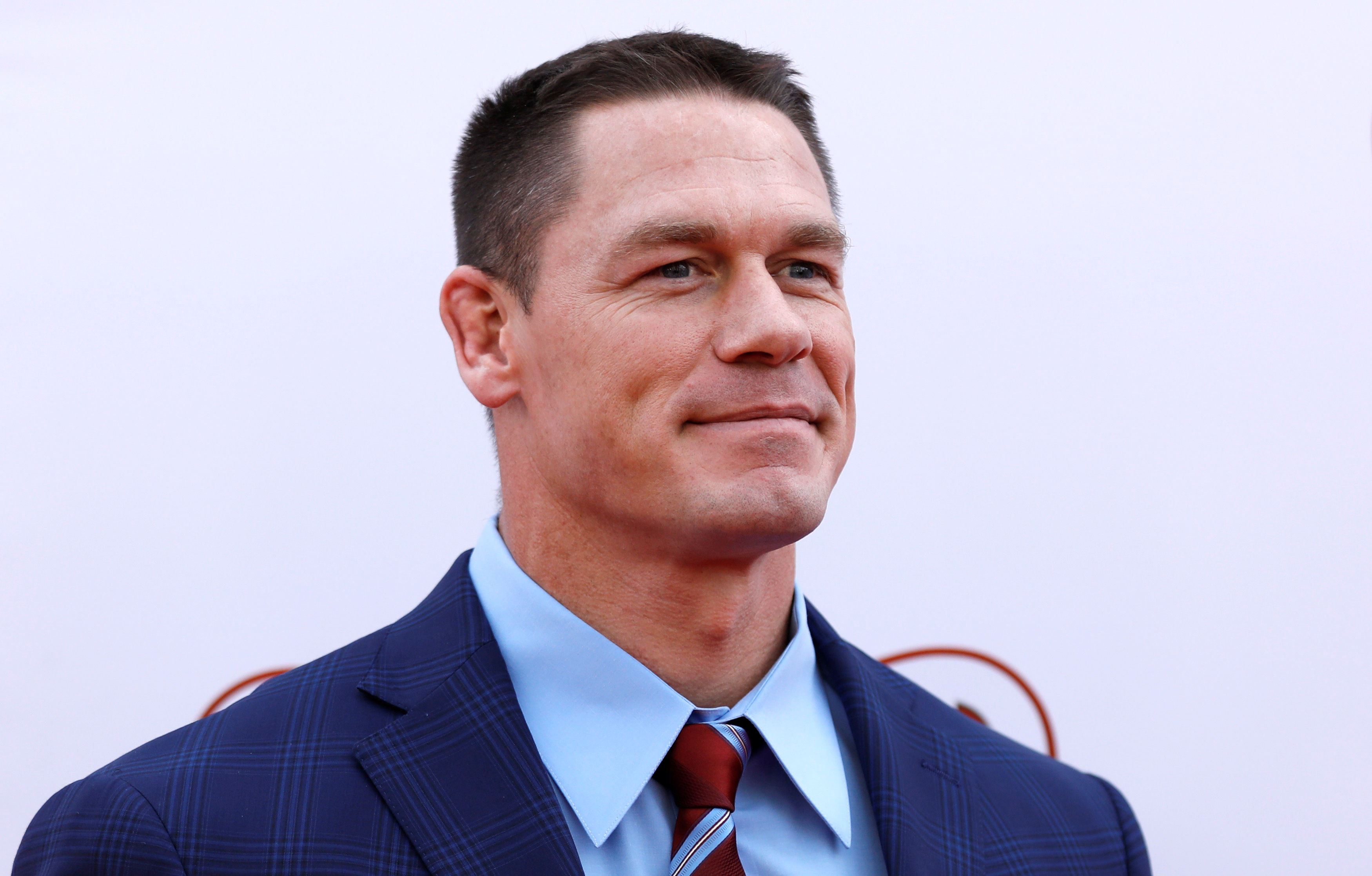 Cast member Cena poses at the premiere for 