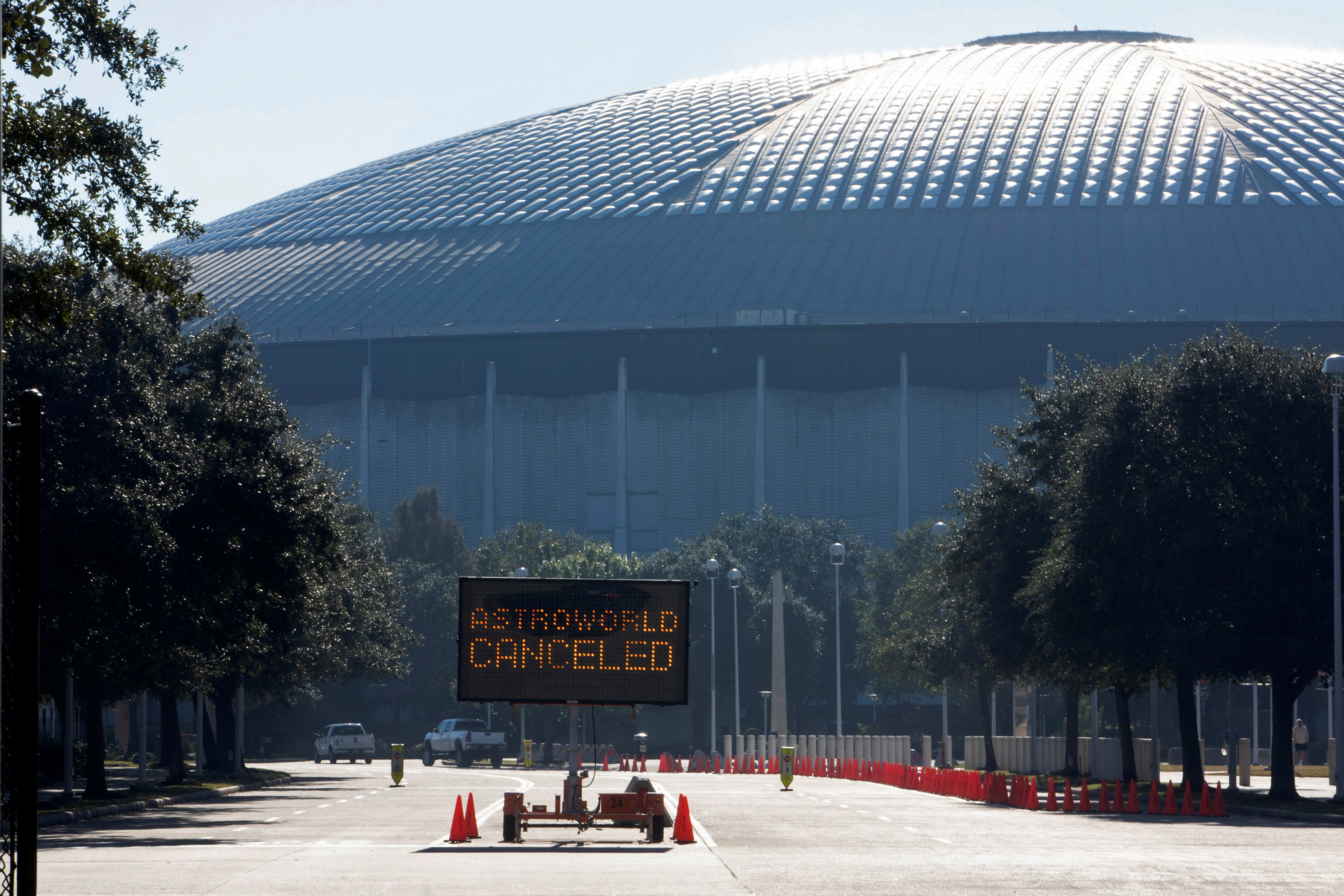 An electronic sign at the entrance to NRG Park states that the Astroworld Festival is cancelled in Houston
