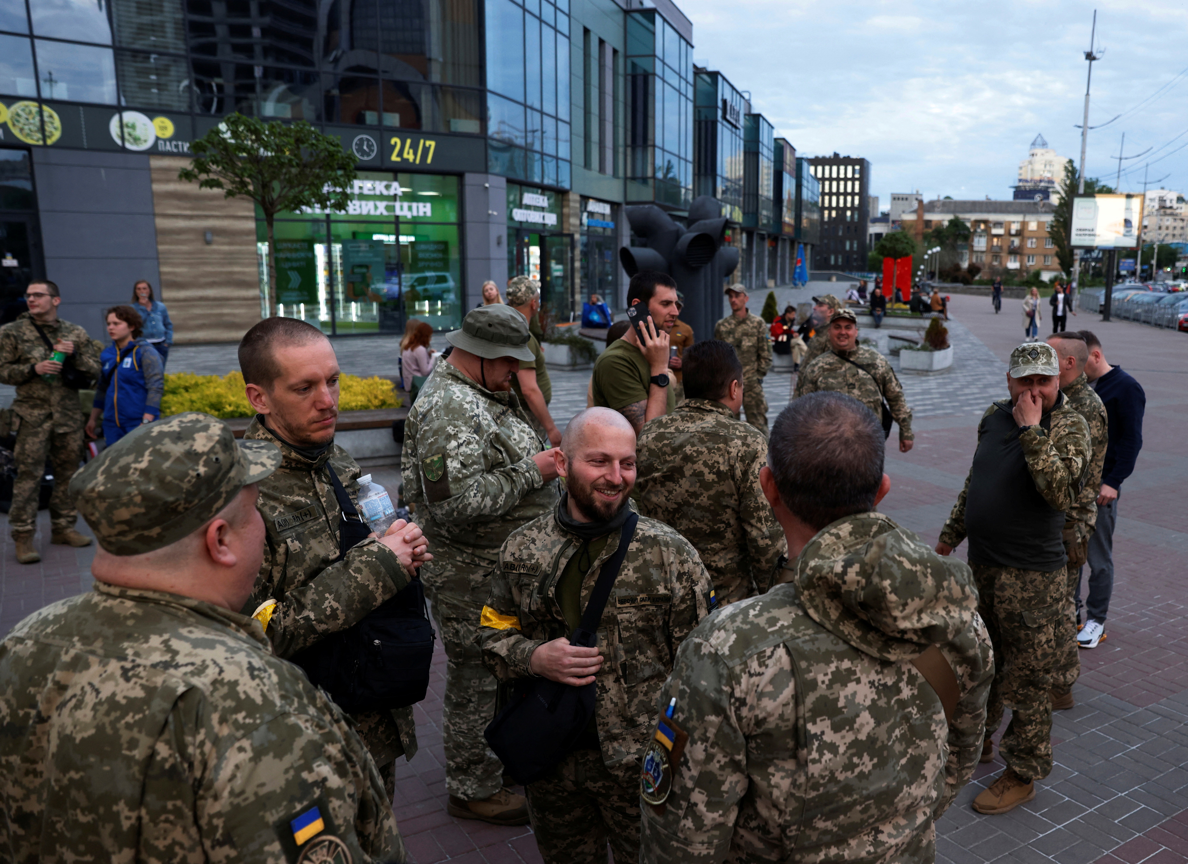 Couple leave for the frontline to serve the Territorial Defence army, in Kyiv