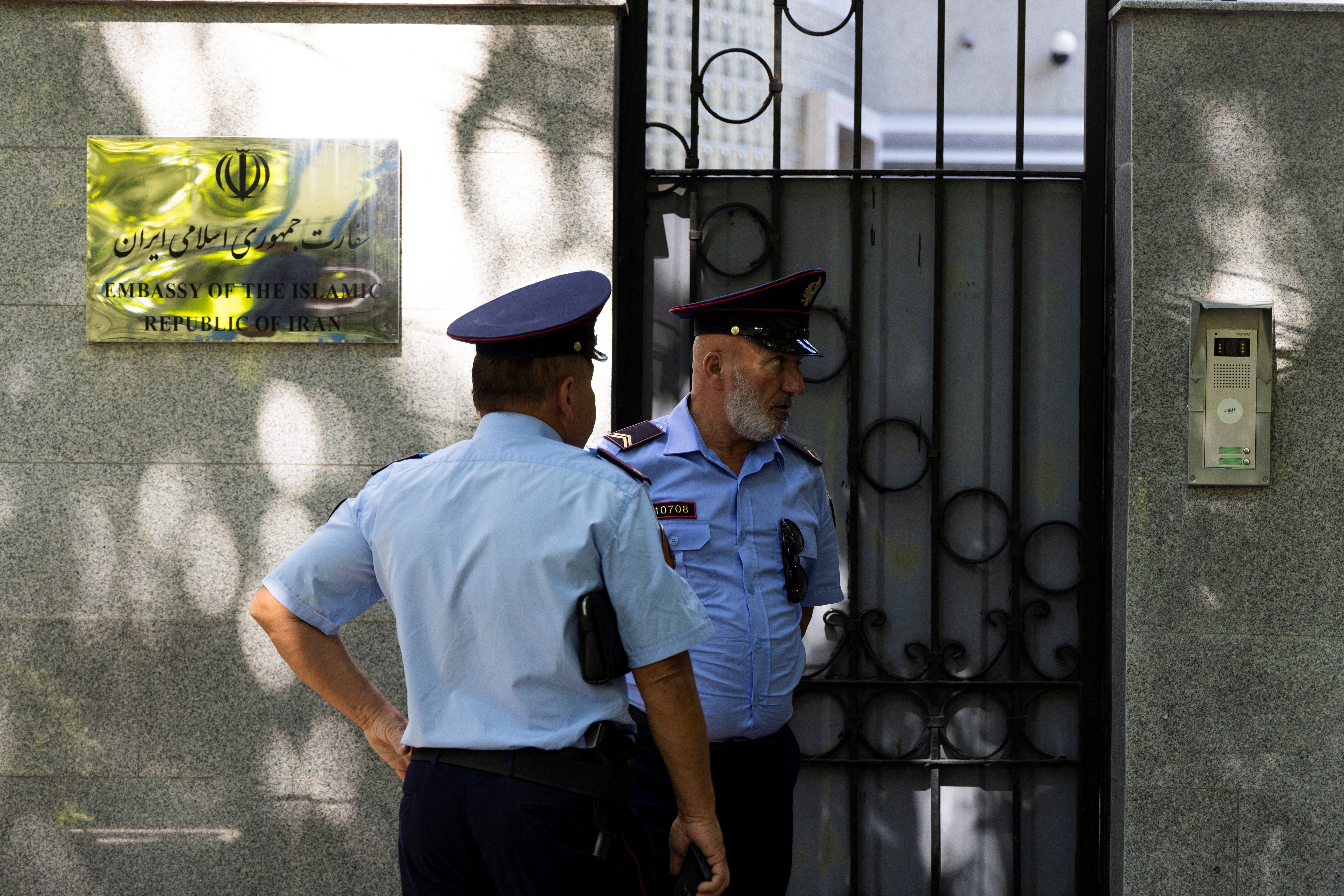 Police officers stands in front of the Embassy of the Islamic Republic of Iran in Tirana