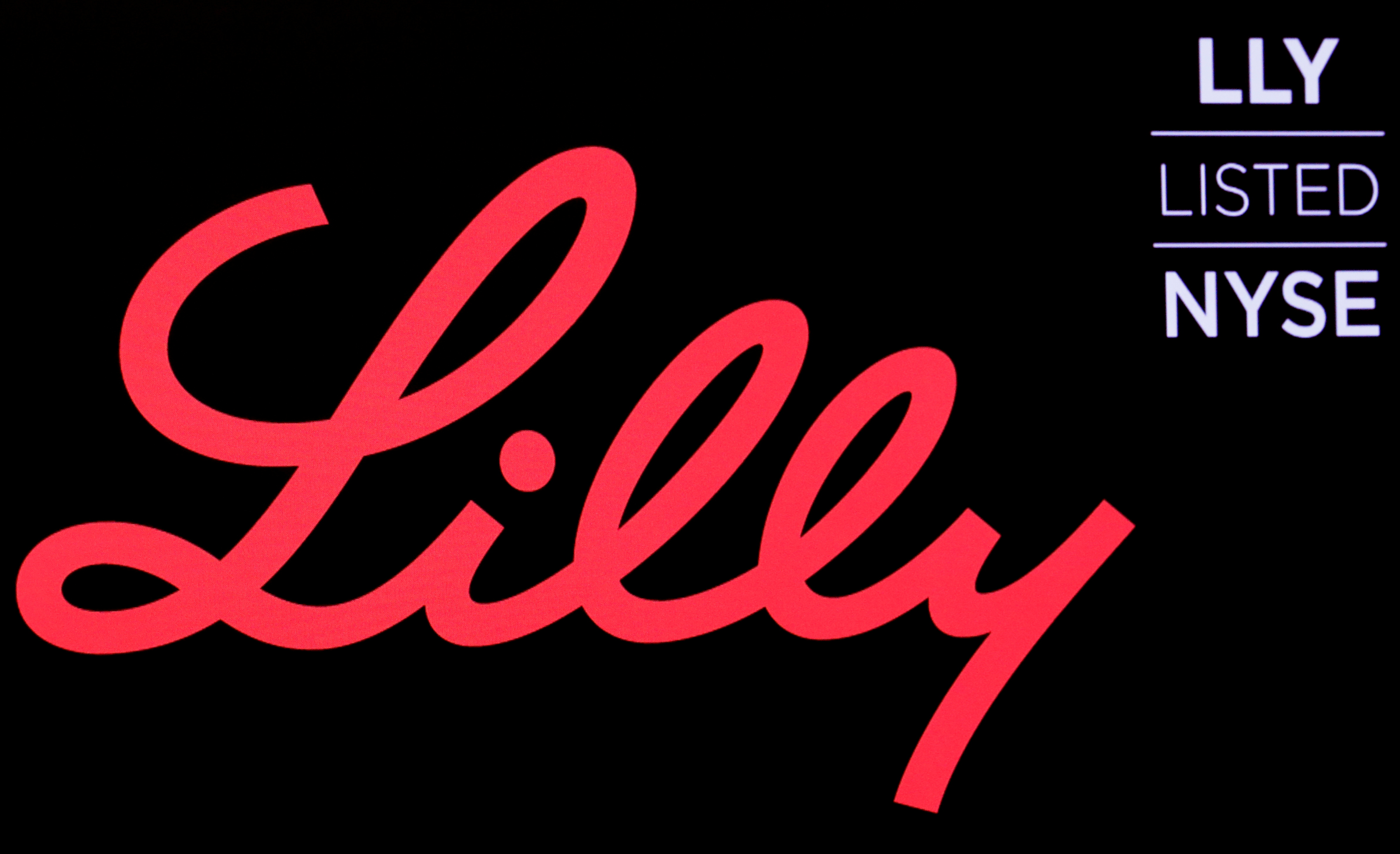 The logo and ticker for Eli Lilly and Co. are displayed on a screen on the floor of the NYSE in New York