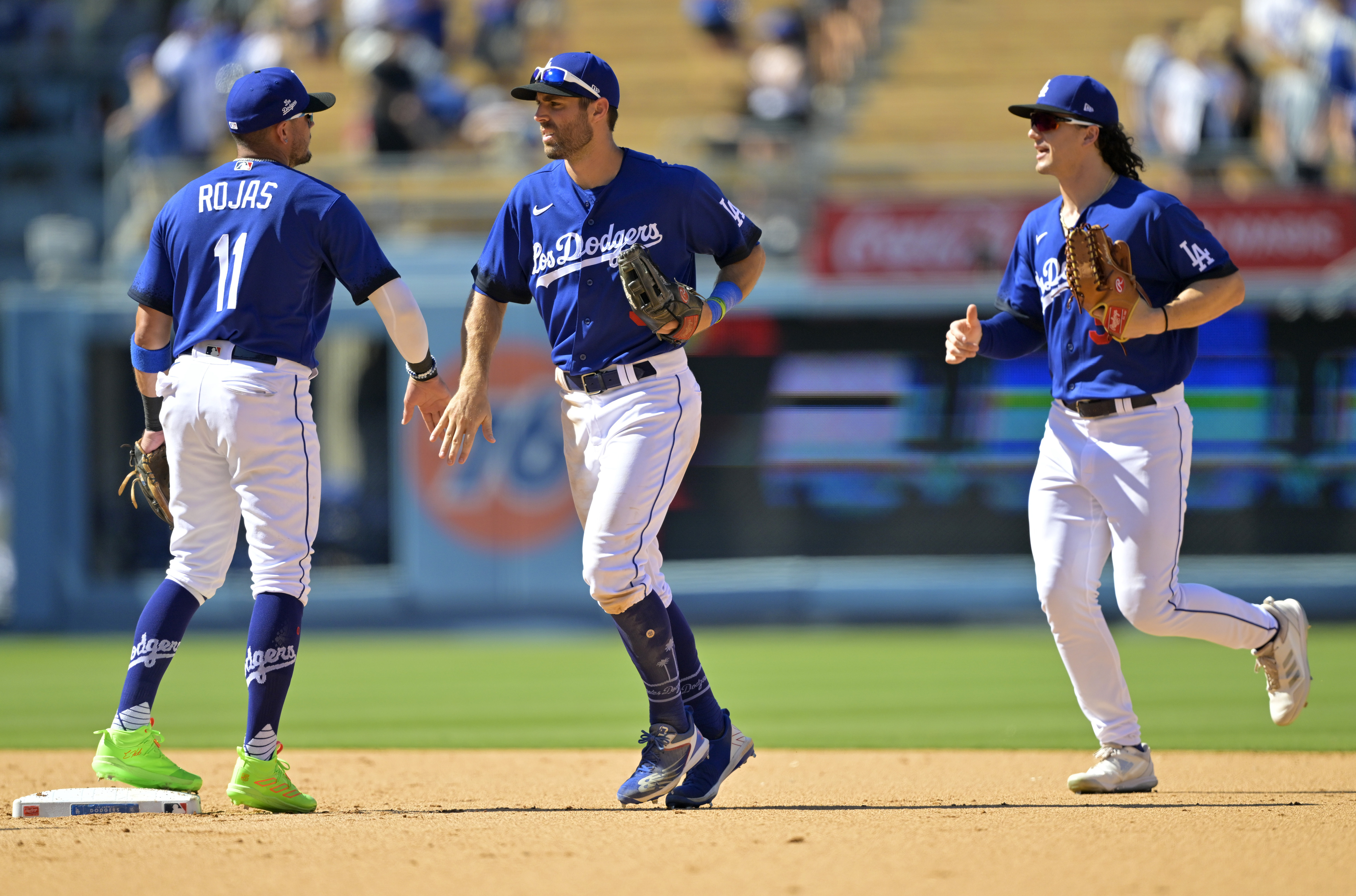 Miguel Rojas, Julio Urias help Dodgers finish 4-game sweep of Rockies