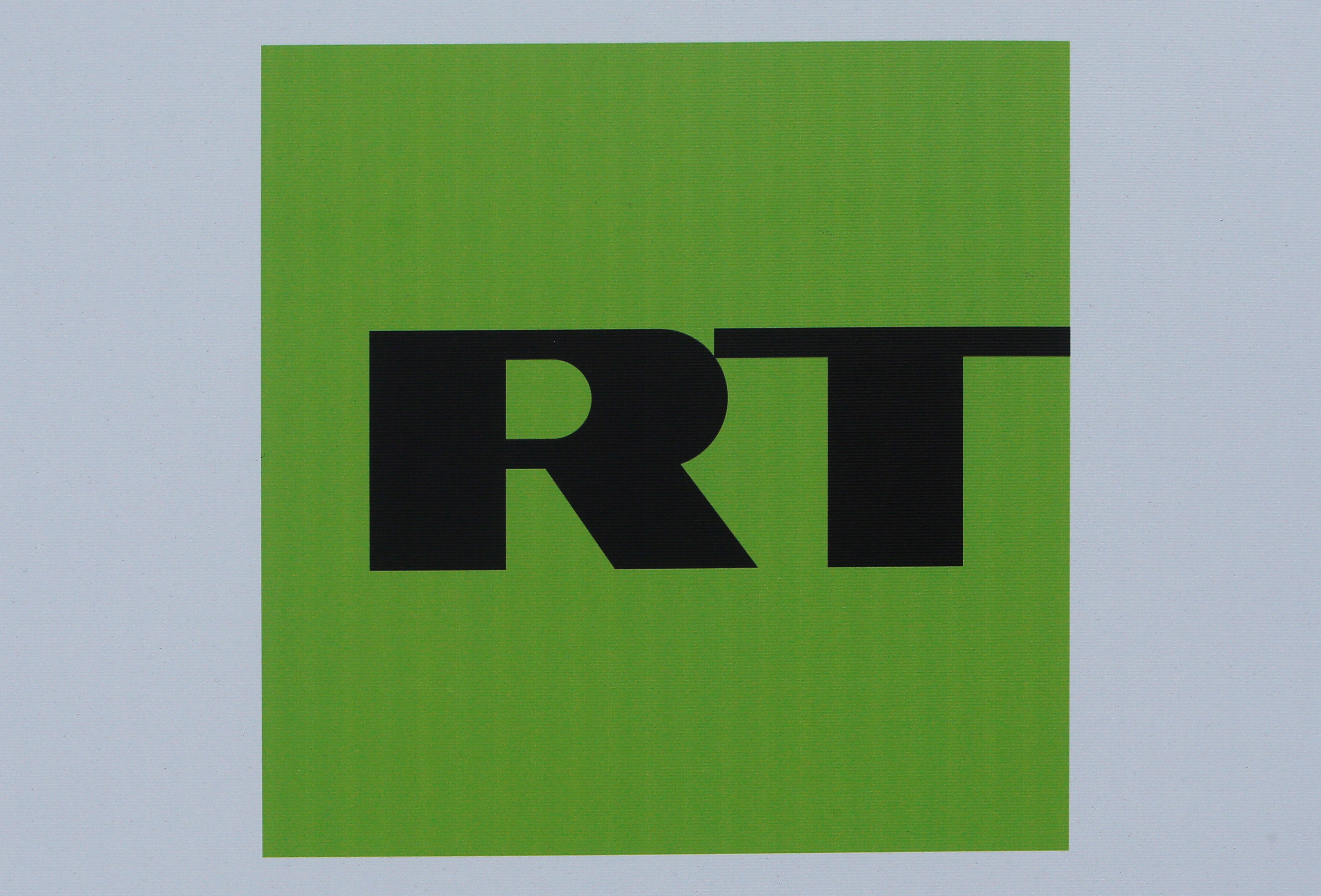 The logo of Russian television network RT is seen on a board at the SPIEF 2017 in St. Petersburg