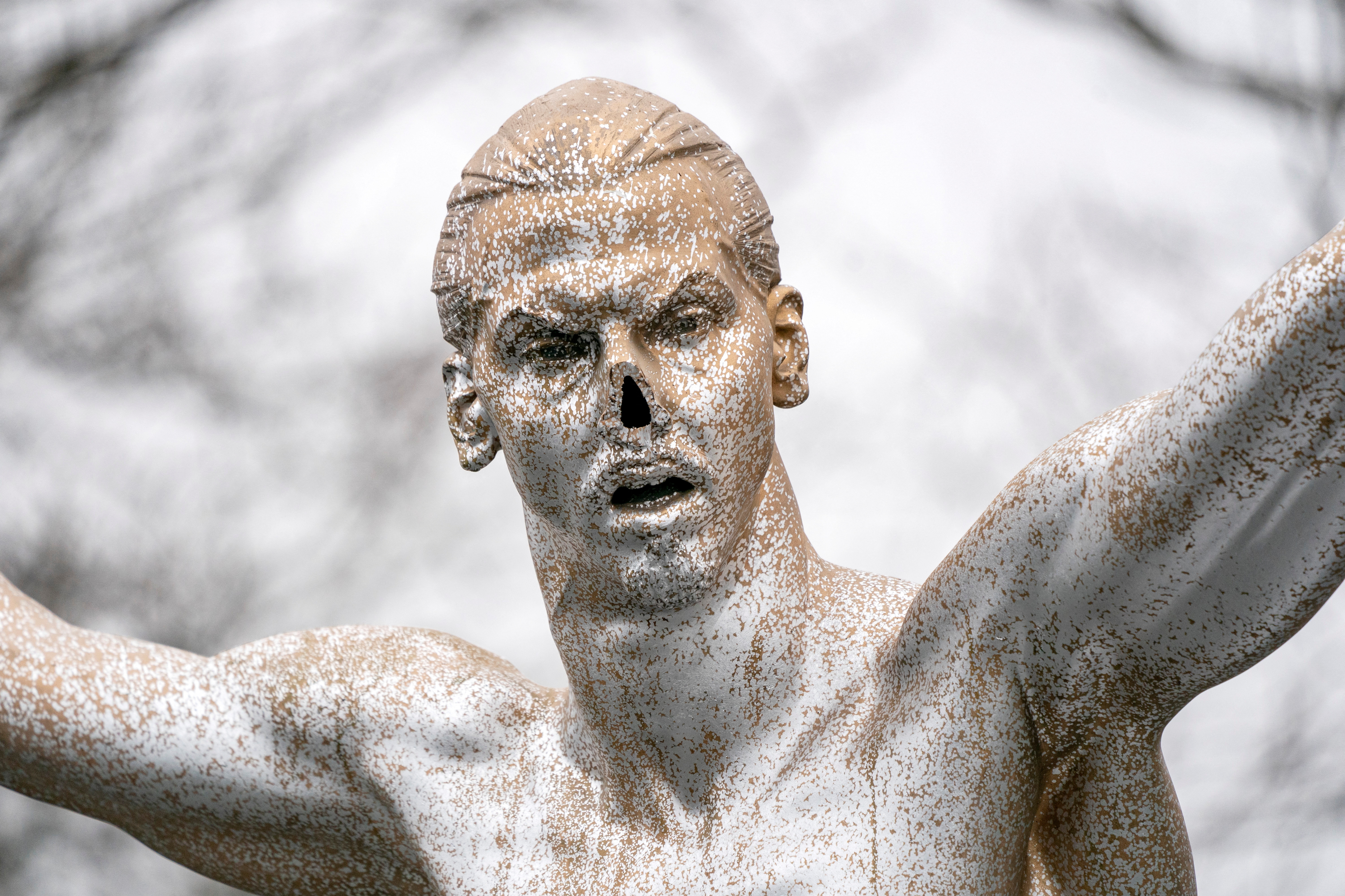 Vandalized Zlatan Ibrahimovic statue is seen in Malmo