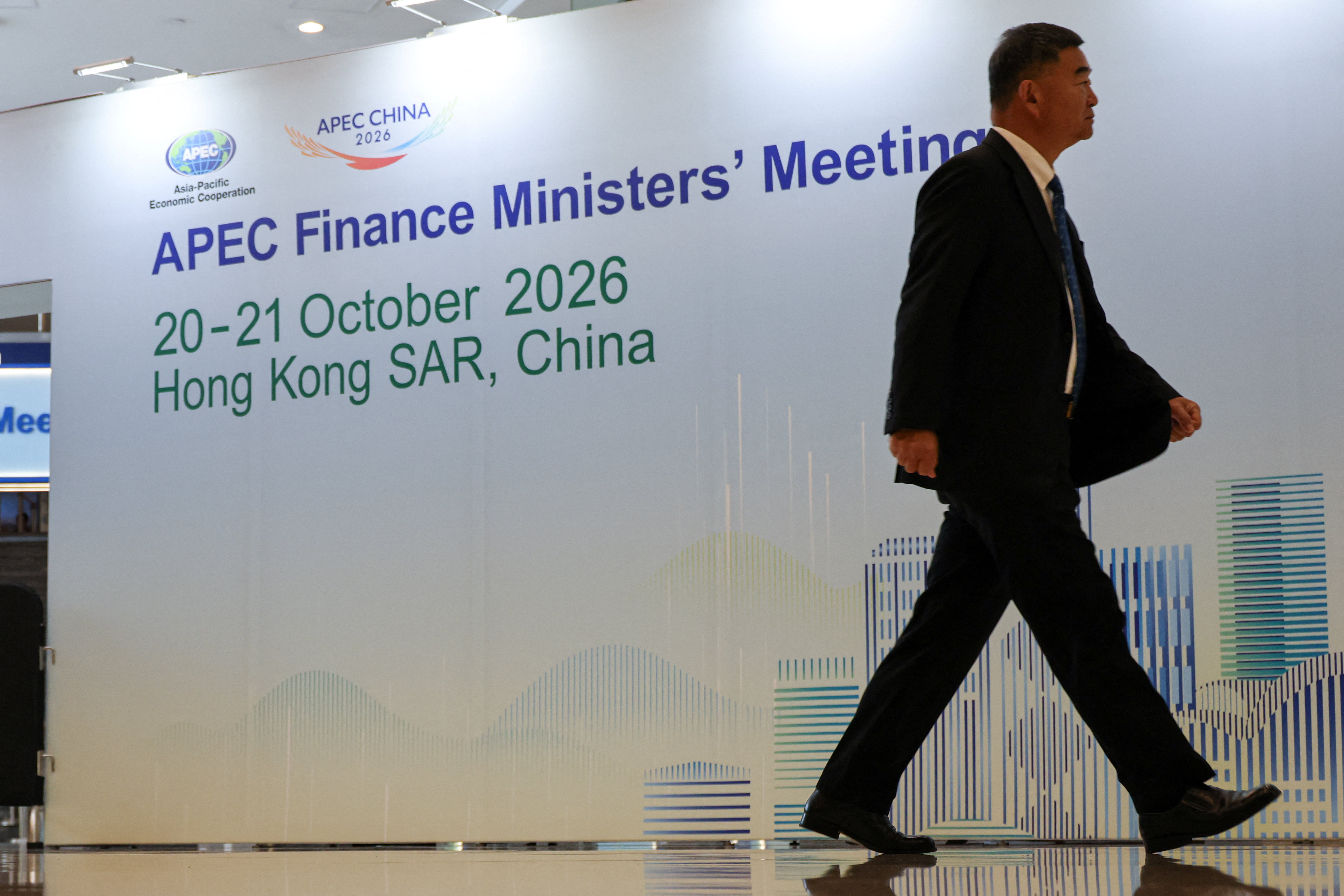 China urges APEC officials to contain economic uncertainty