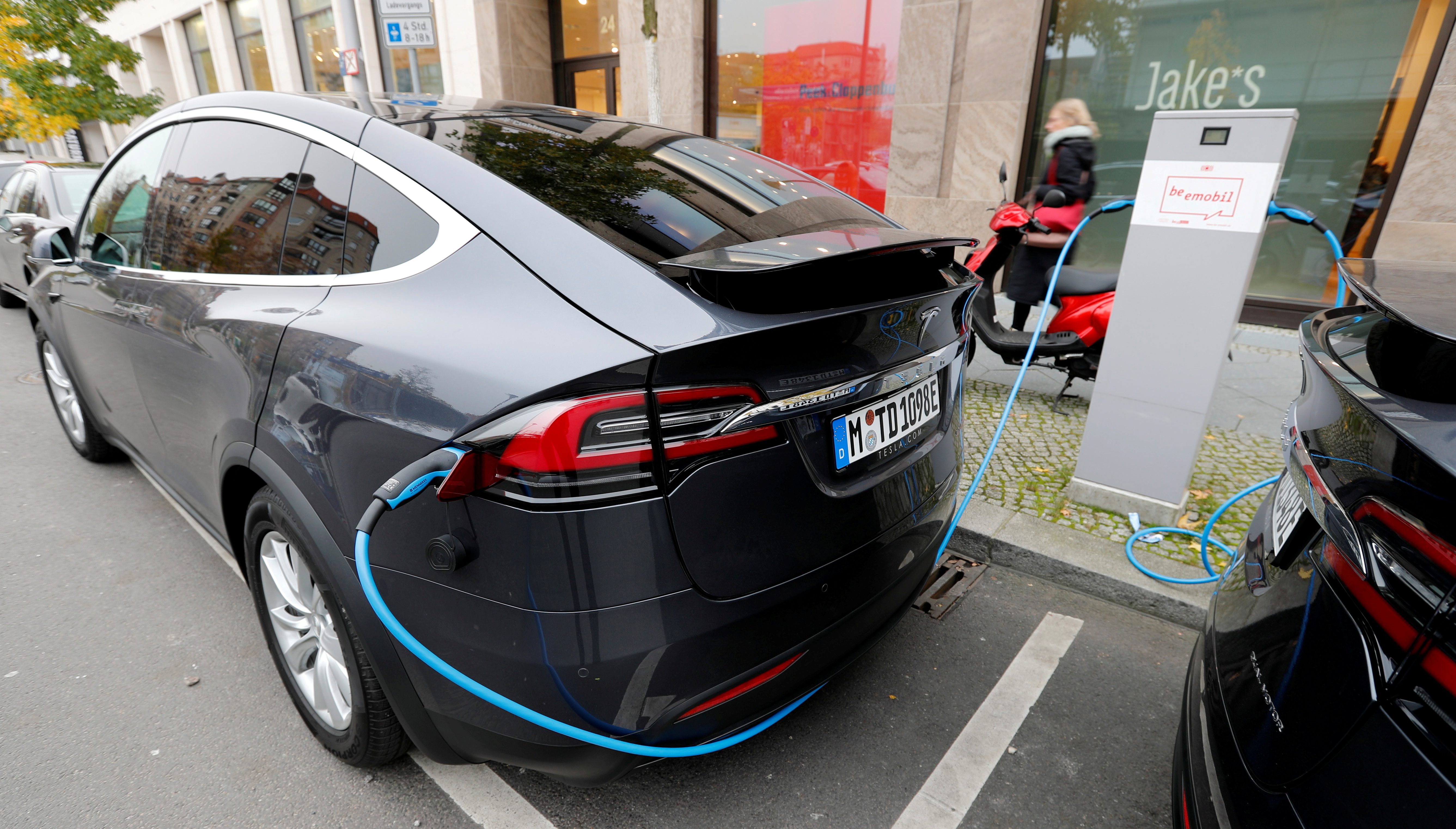 Tesla Model X electric cars recharge their batteries in Berlin