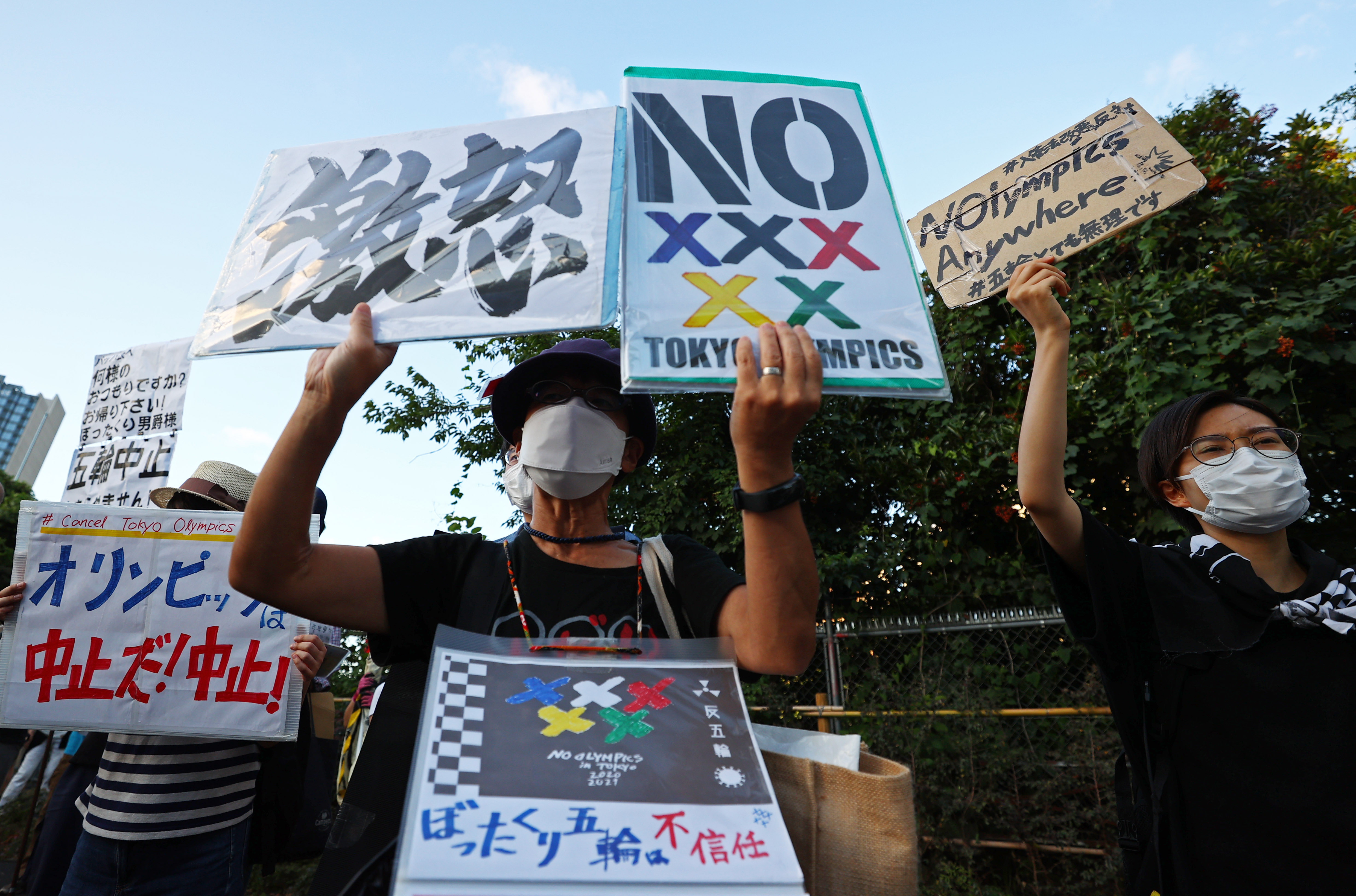 People protest against the Tokyo 2020 Olympic Games