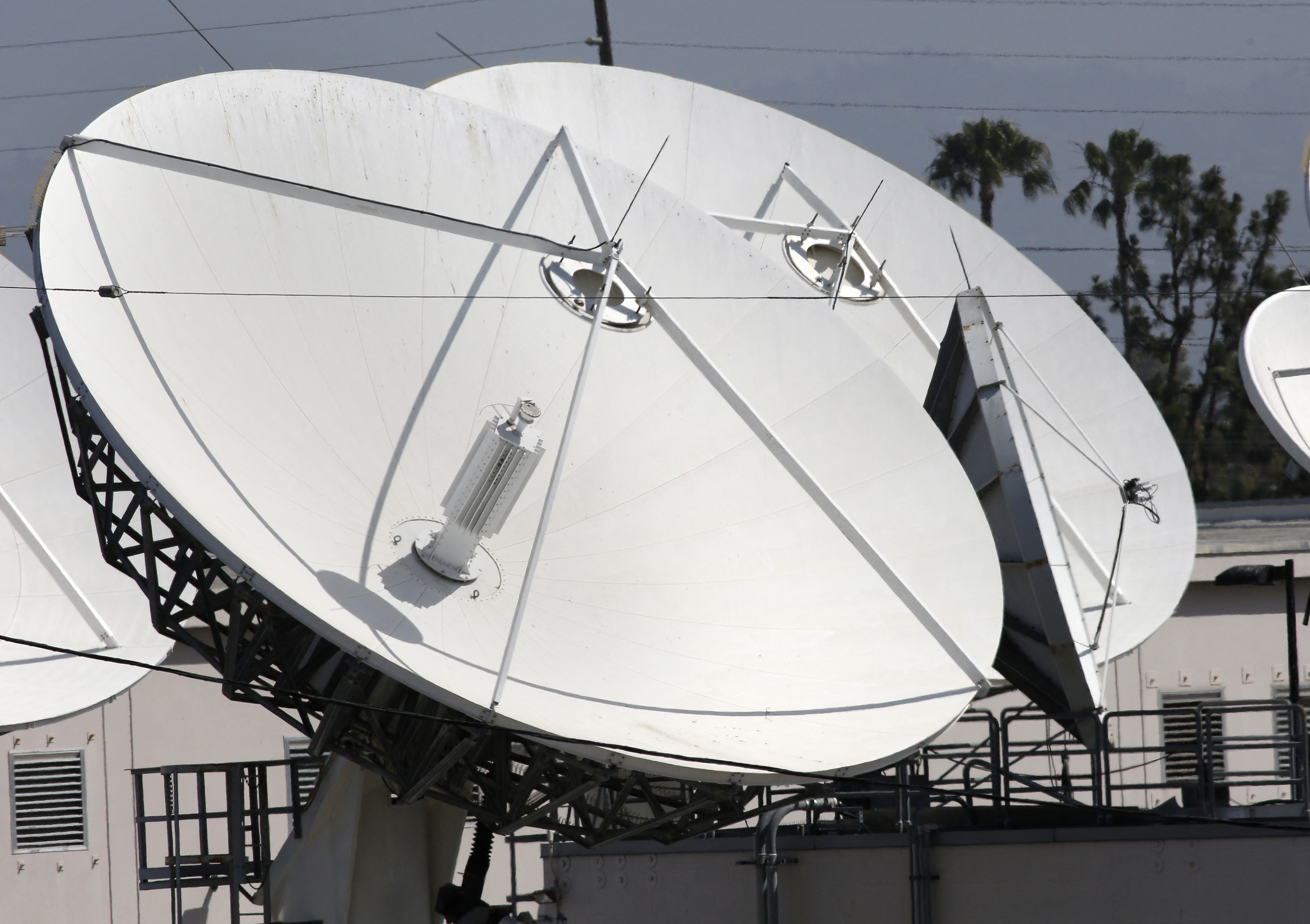 Large satellite dishes at the Los Angeles Broadcast Center  of U.S. satellite TV operator DirecTV are seen in Los Angeles