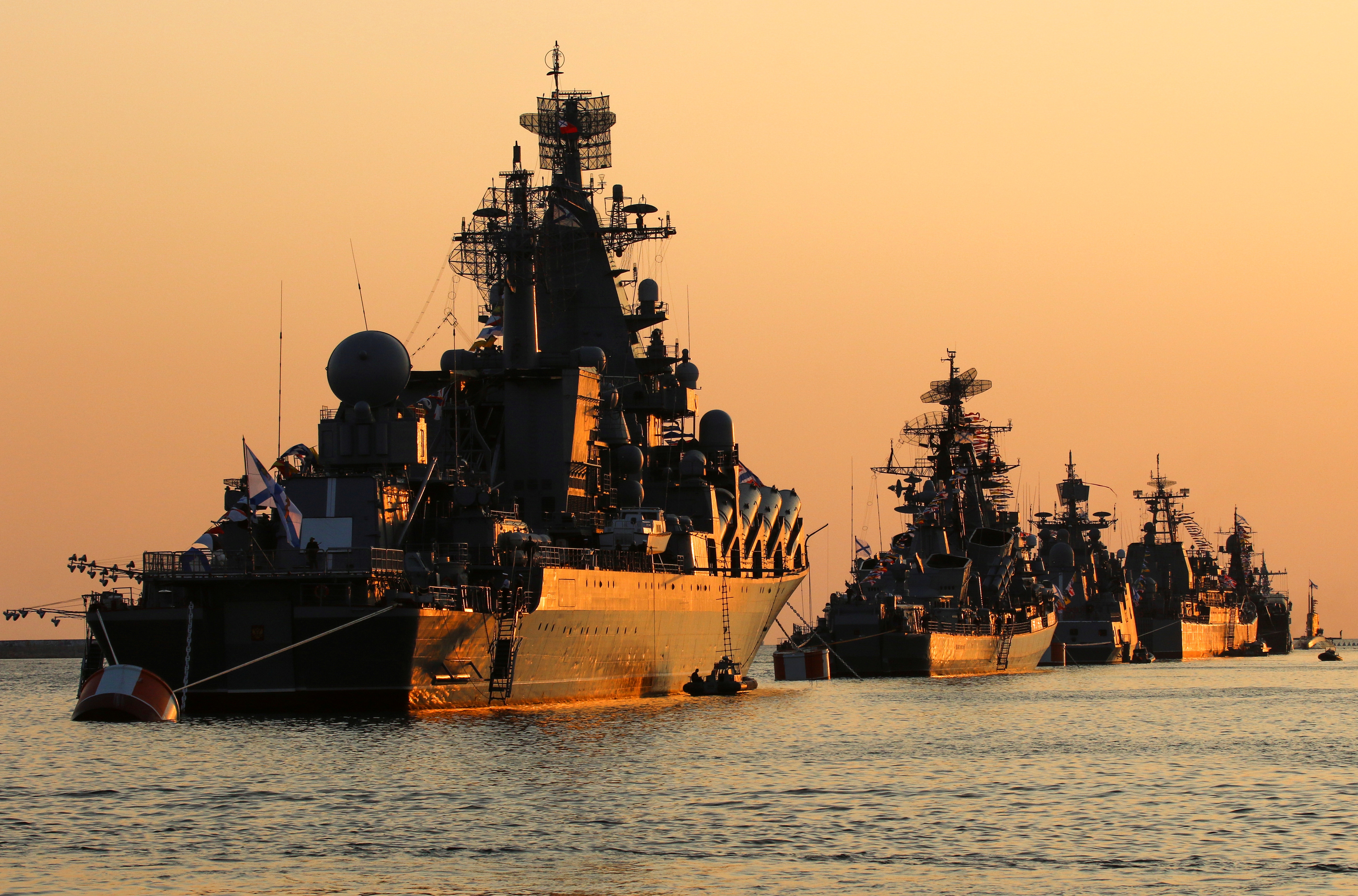 A view shows Russian warships on sunset ahead of the Navy Day parade in the Black Sea port of Sevastopol